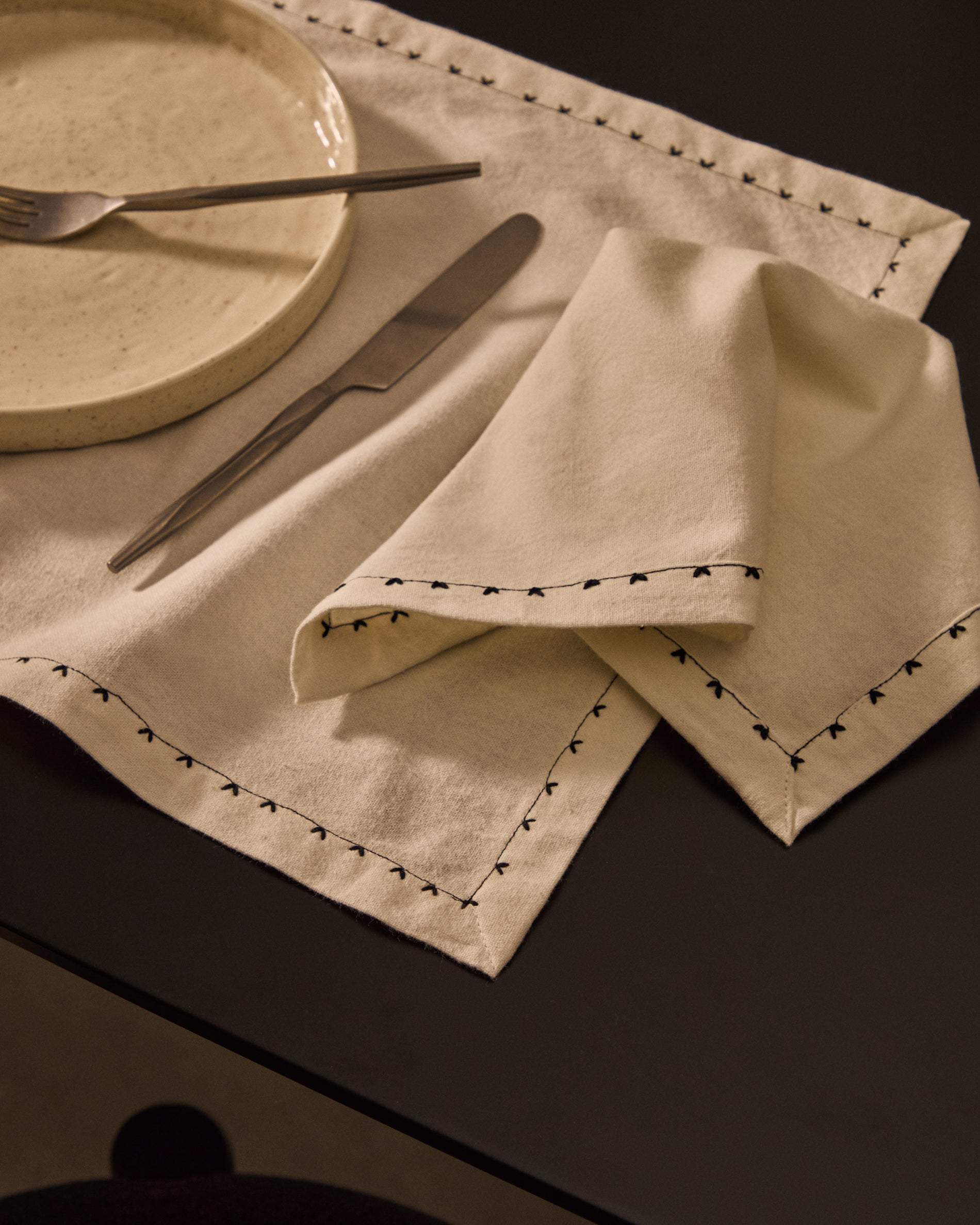 Olim set of two beige, 100% cotton napkins with black embroidery detail - Lifestyle