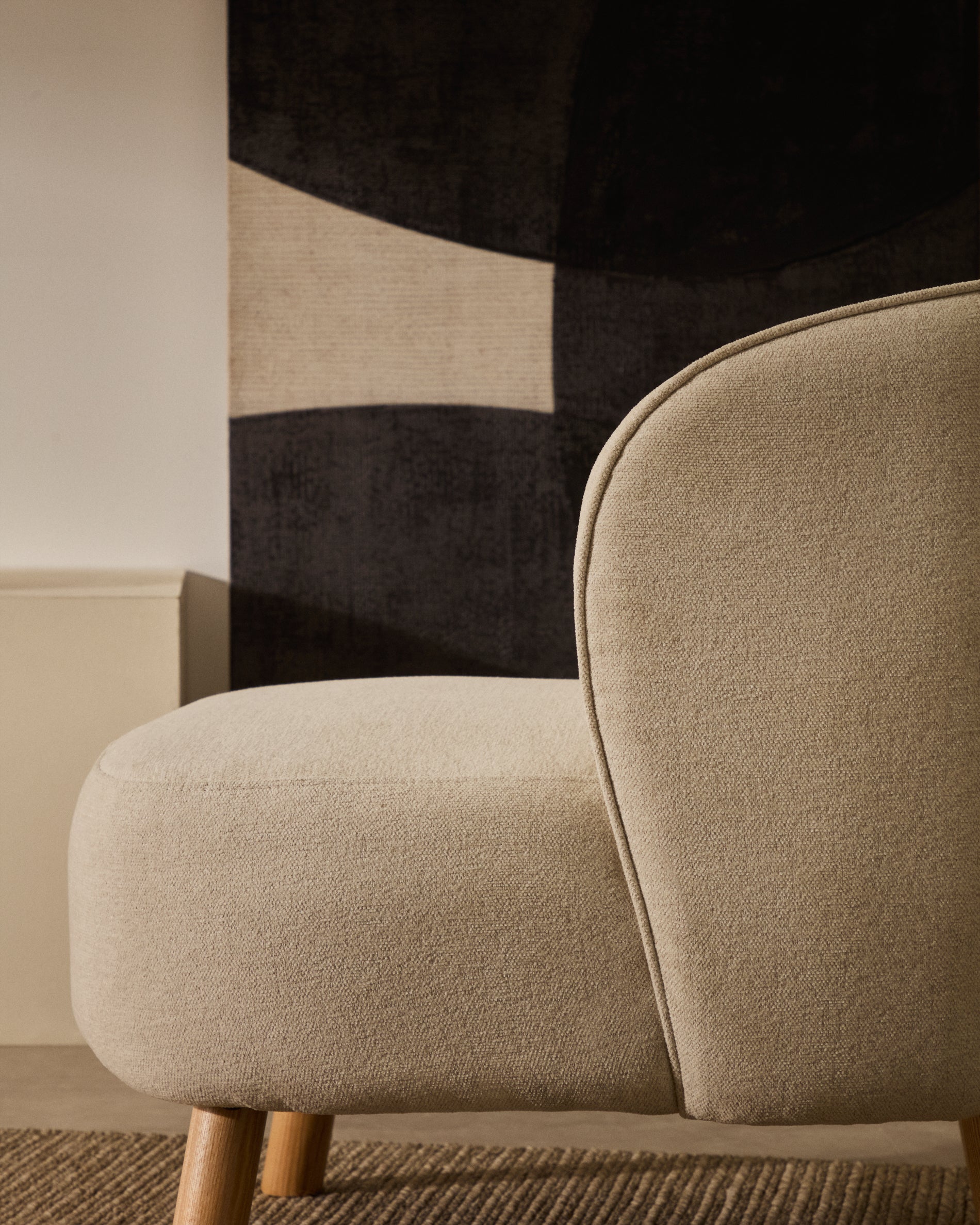 Ulit armchair in beige chenille with solid beech wood legs in a natural finish - Lifestyle