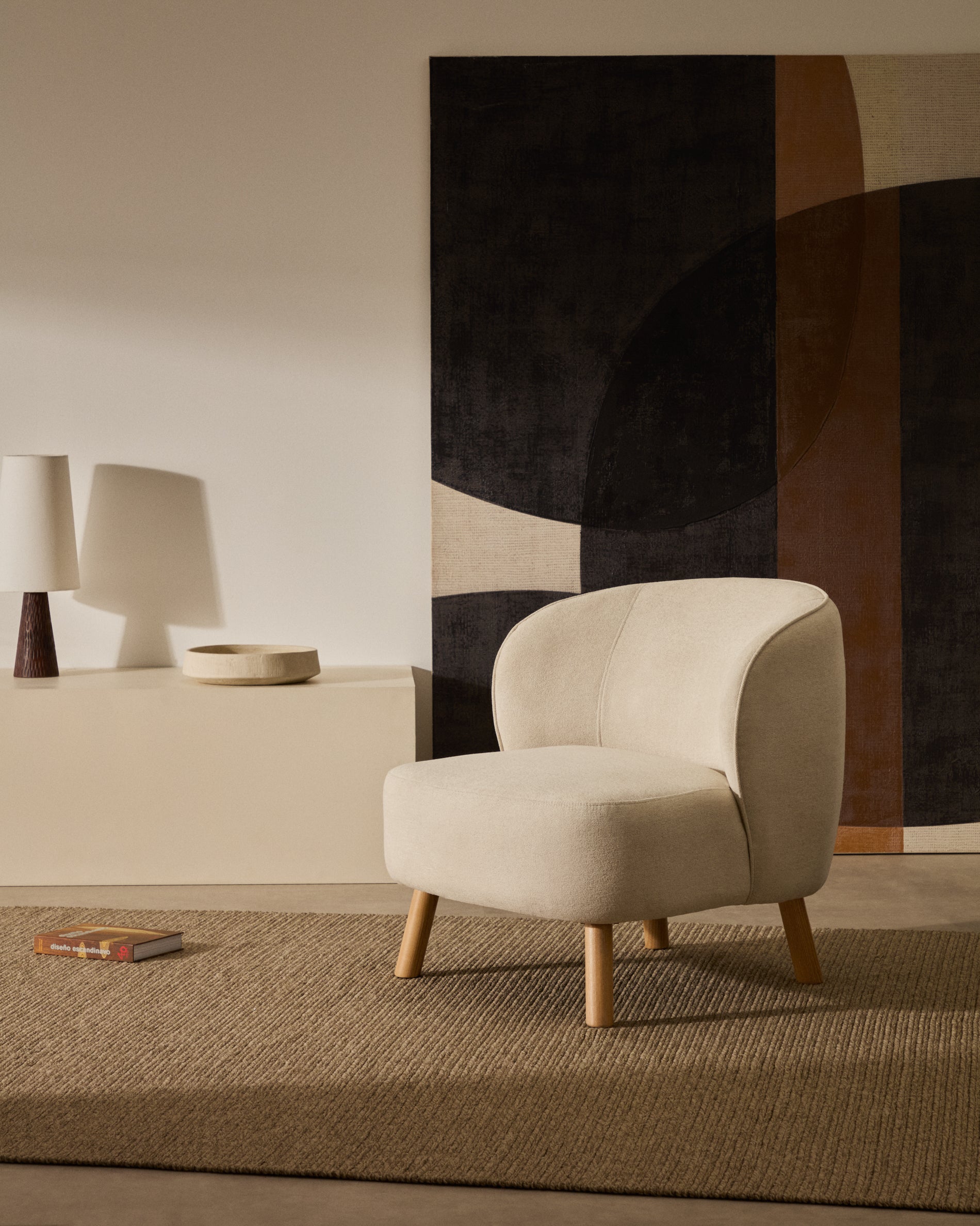 Ulit armchair in beige chenille with solid beech wood legs in a natural finish - Lifestyle