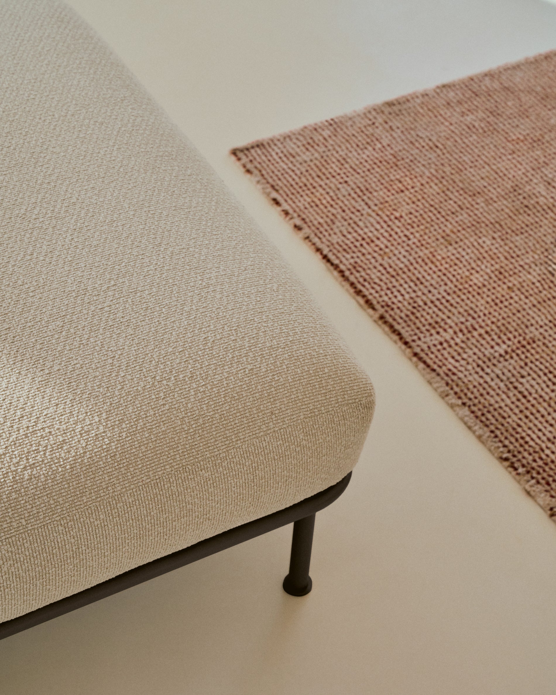 Aurum ecru chenille footrest with matte grey metal base 85 x 85cm FSC Mix Credit - Lifestyle