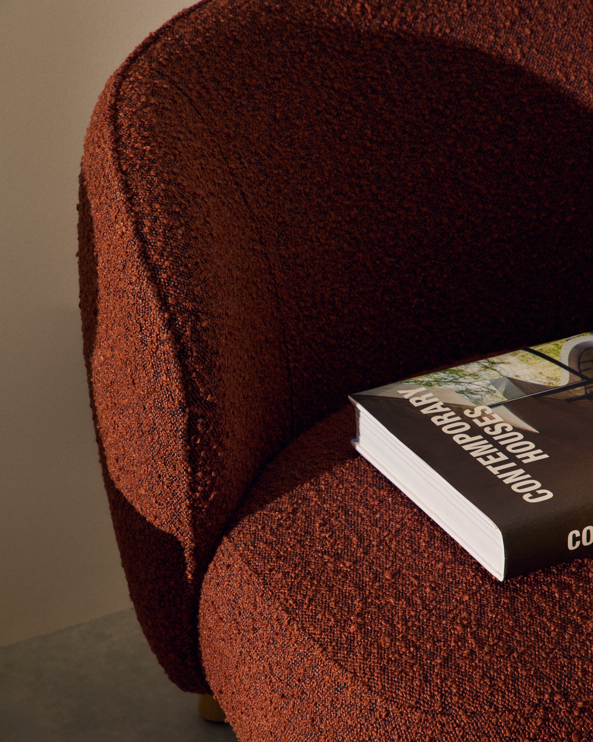 Ulit armchair in terracotta bouclé with solid beech wood legs in a natural finish - Lifestyle
