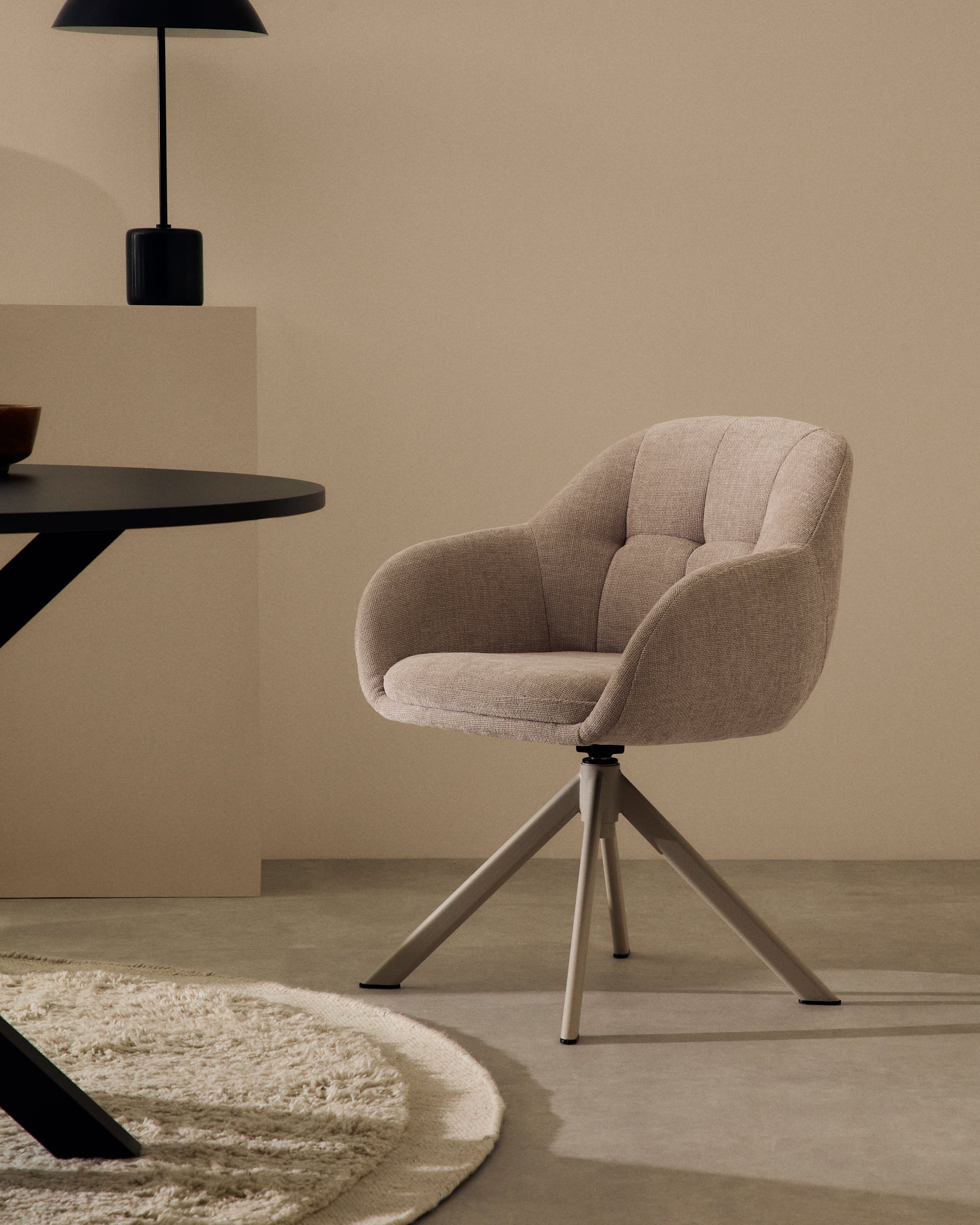 Dorina swivel chair in beige chenille and steel legs in a beige finish - Lifestyle