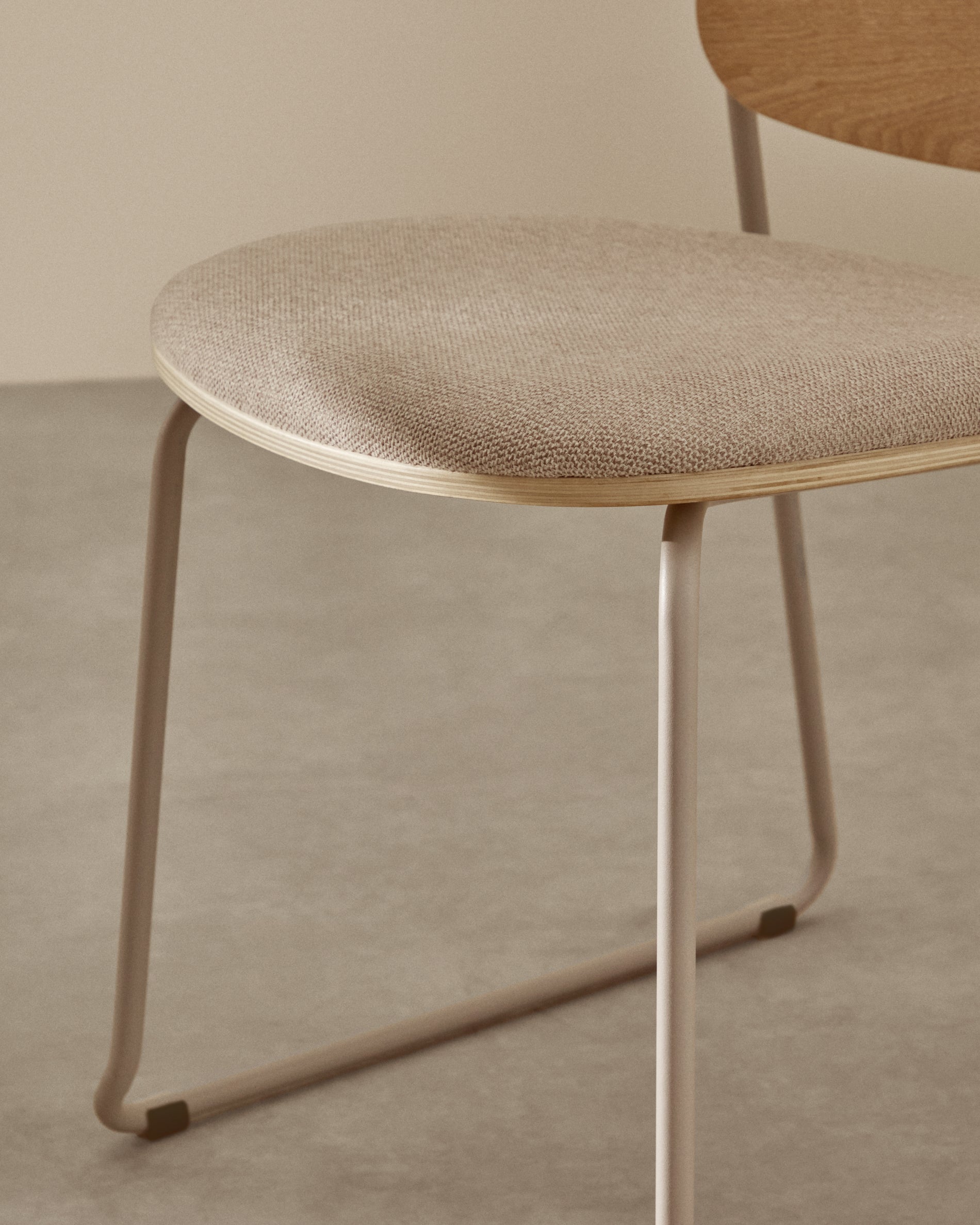 Meli stackable chair in poplar plywood with beige chenille seat and beige metal legs FSC Mix Credit - Lifestyle