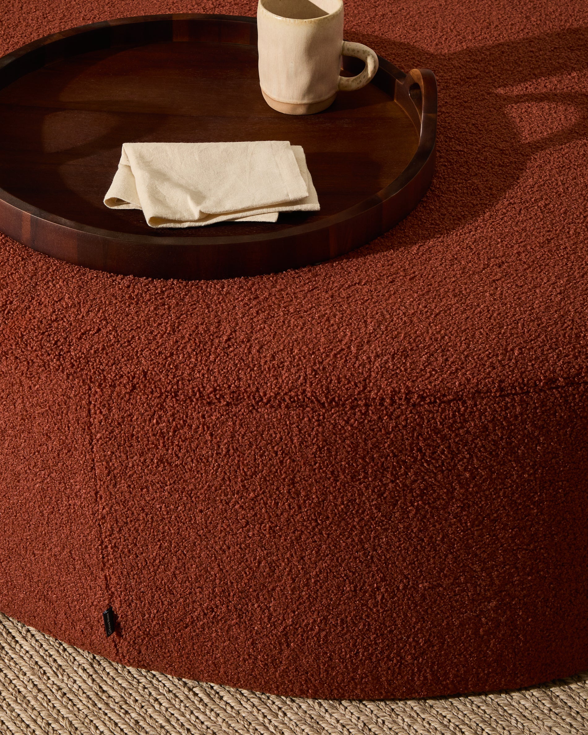 Kaeli footrest with removable cover in terracotta bouclé Ø 90 cm - Lifestyle