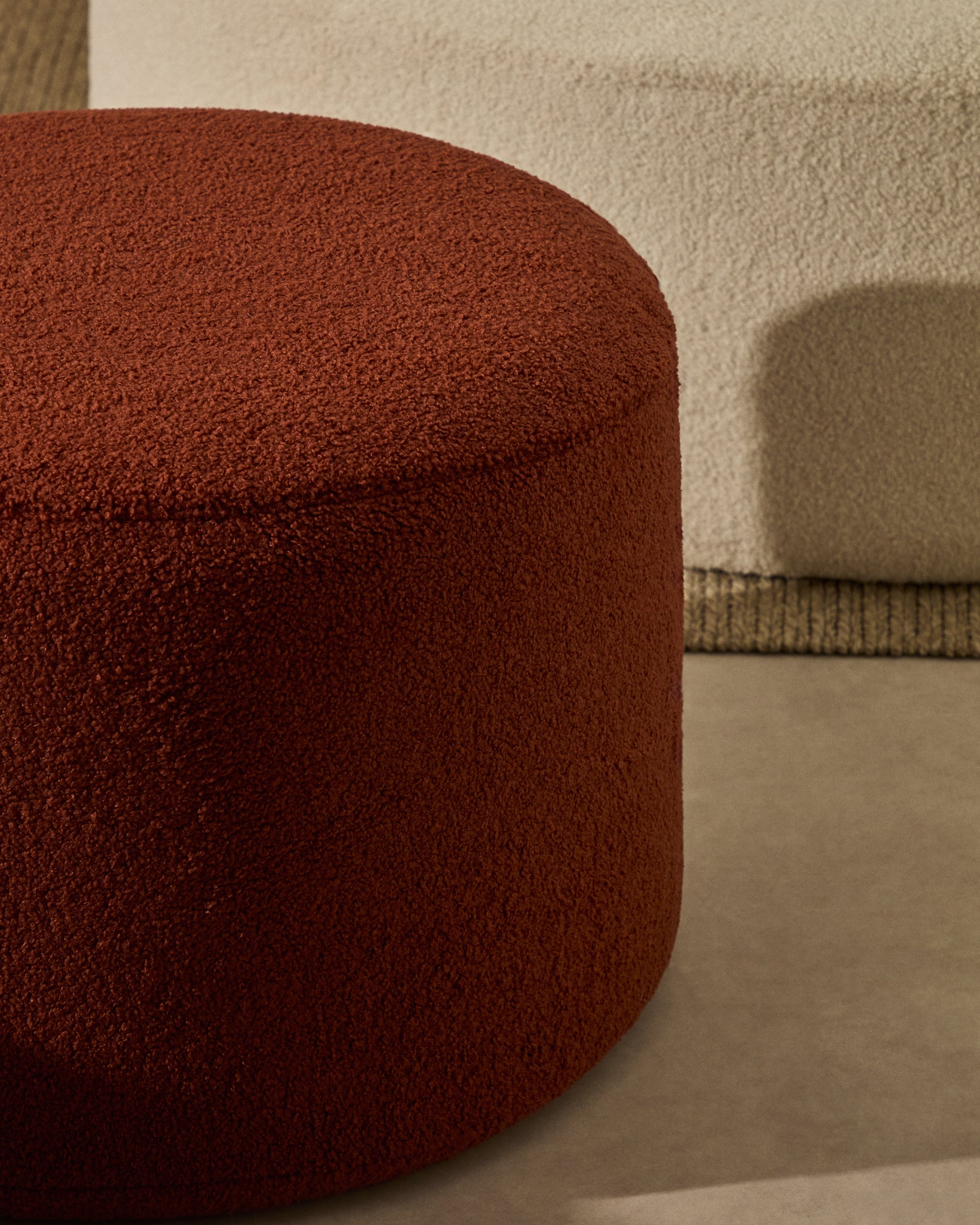 Kaeli footrest with removable cover in terracotta bouclé Ø 60 cm - Lifestyle