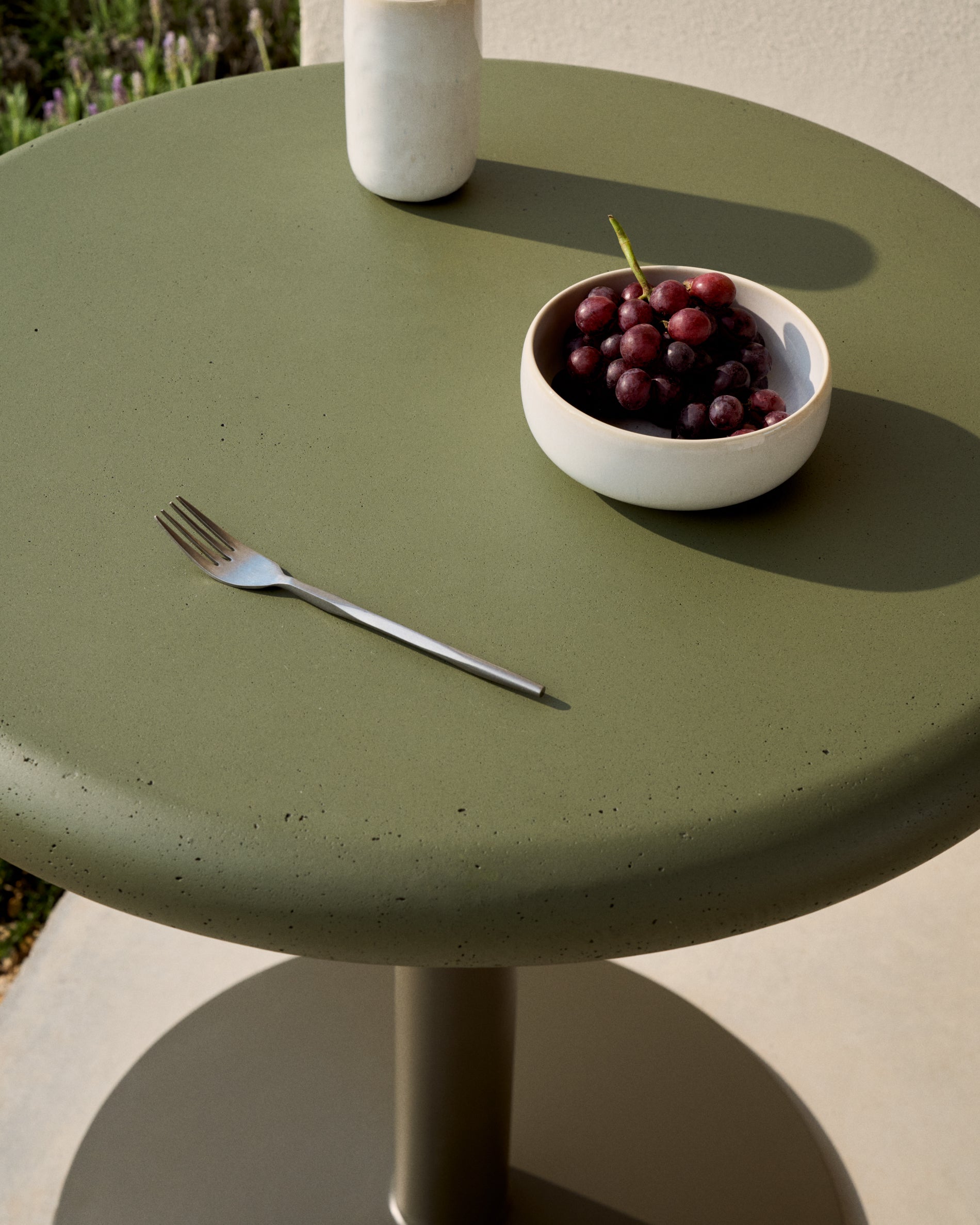 Esilda outdoor round table with green cement top Ø70cm and green steel base Ø55x72cm - Lifestyle