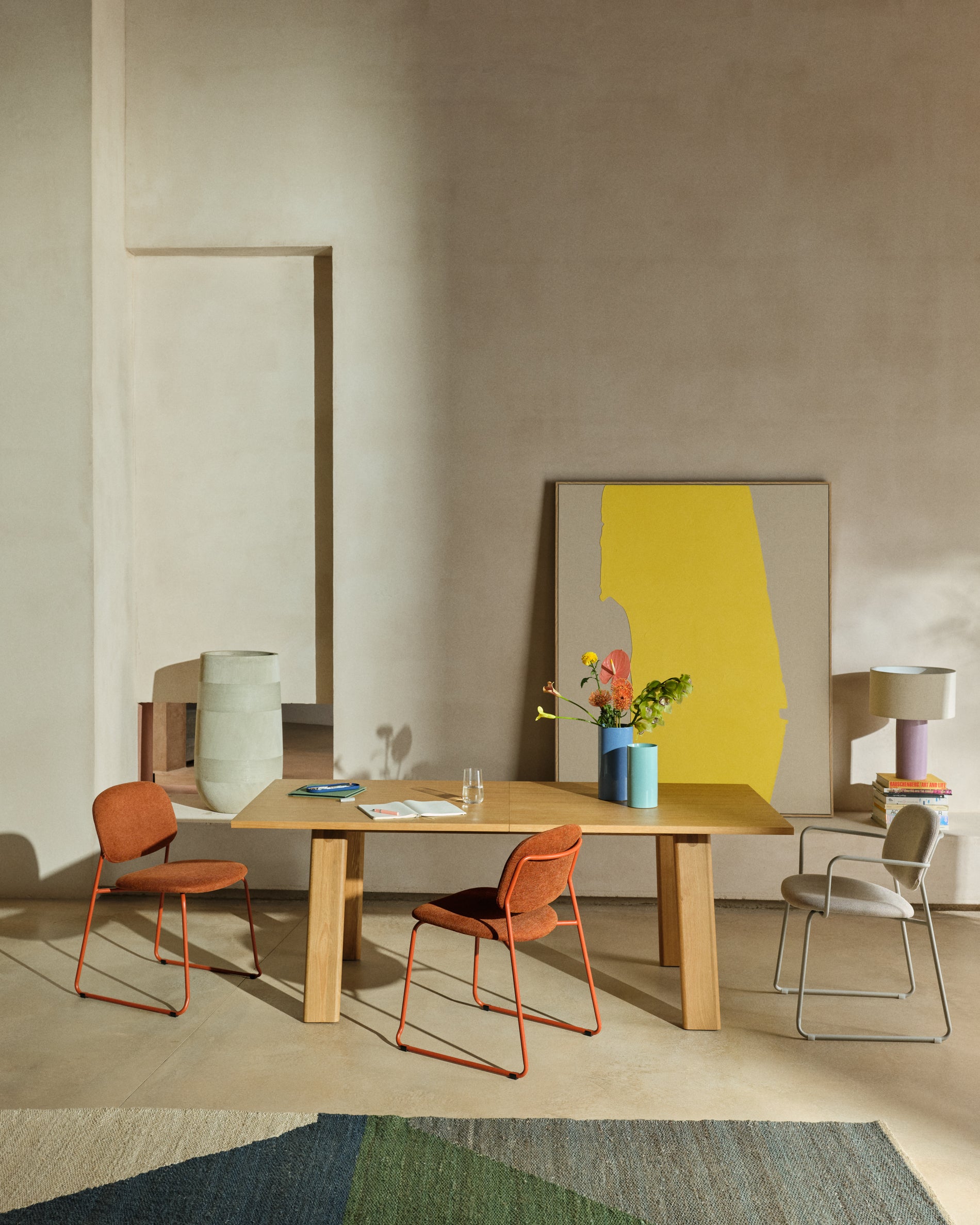 Meli stackable chair in terracotta chenille with terracotta metal legs FSC Mix Credit - Lifestyle