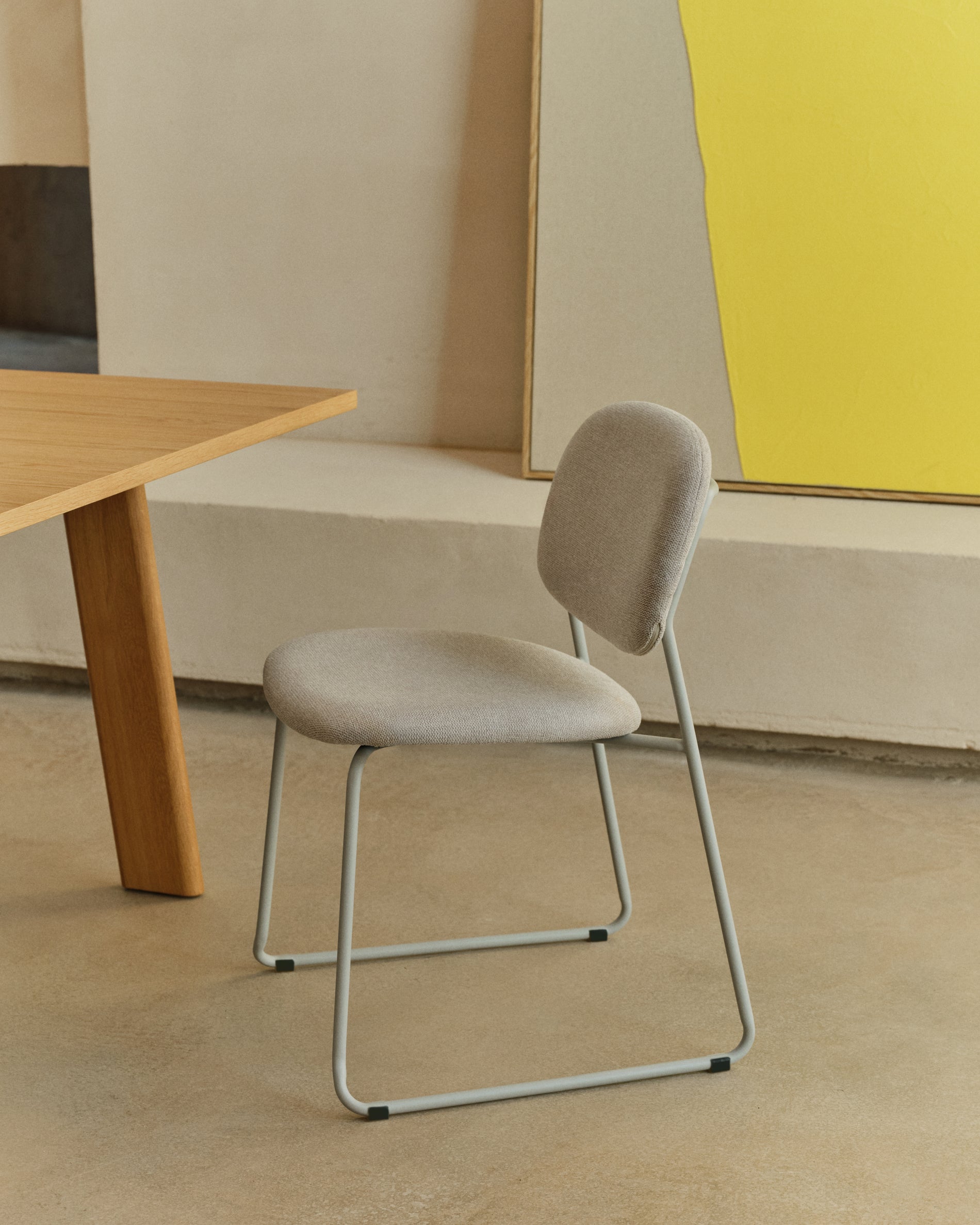 Meli stackable chair in beige chenille with beige metal legs FSC Mix Credit - Lifestyle