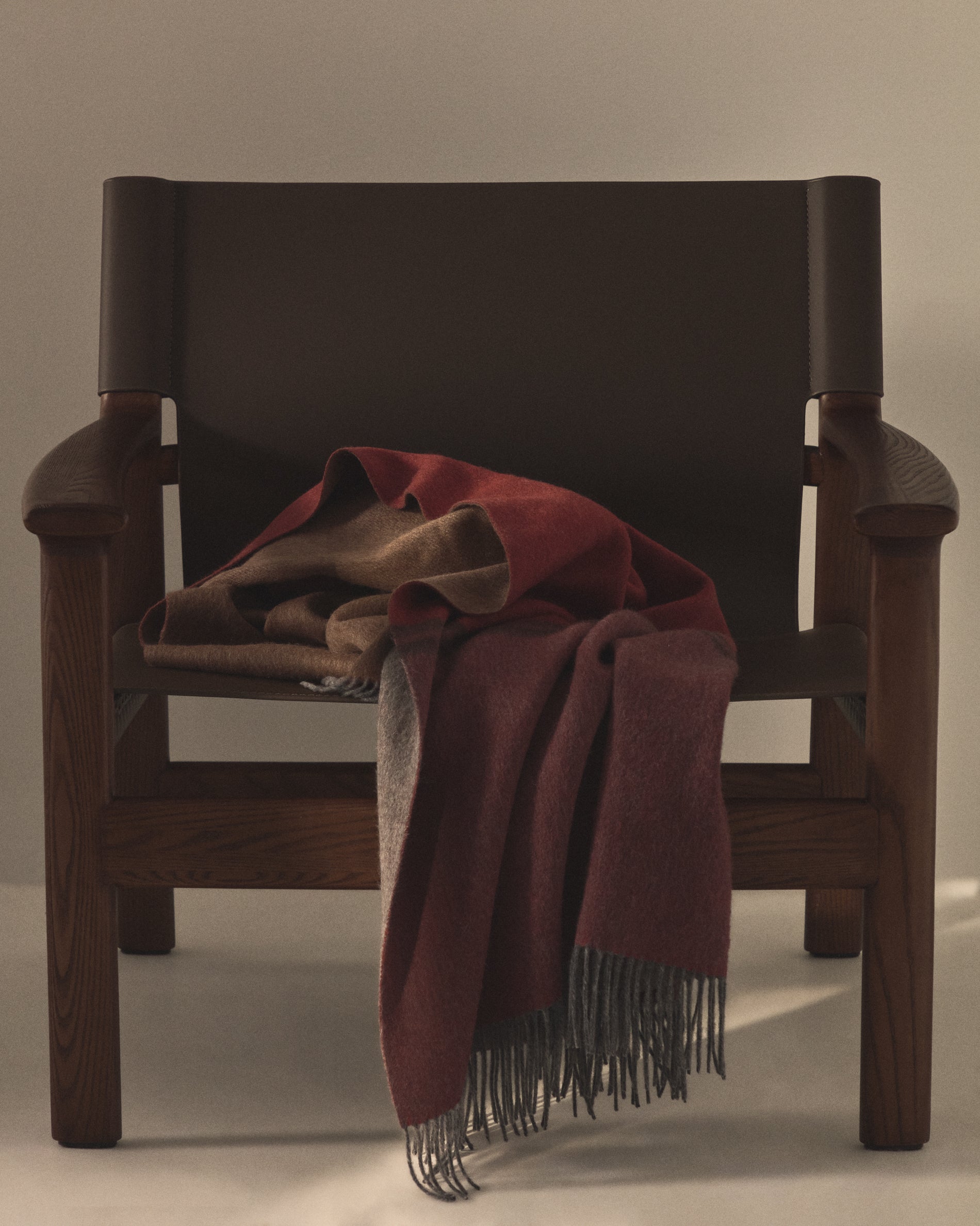 Zunara multicoloured double-sided wool blend blanket with fringing 170 x 130cm - Lifestyle
