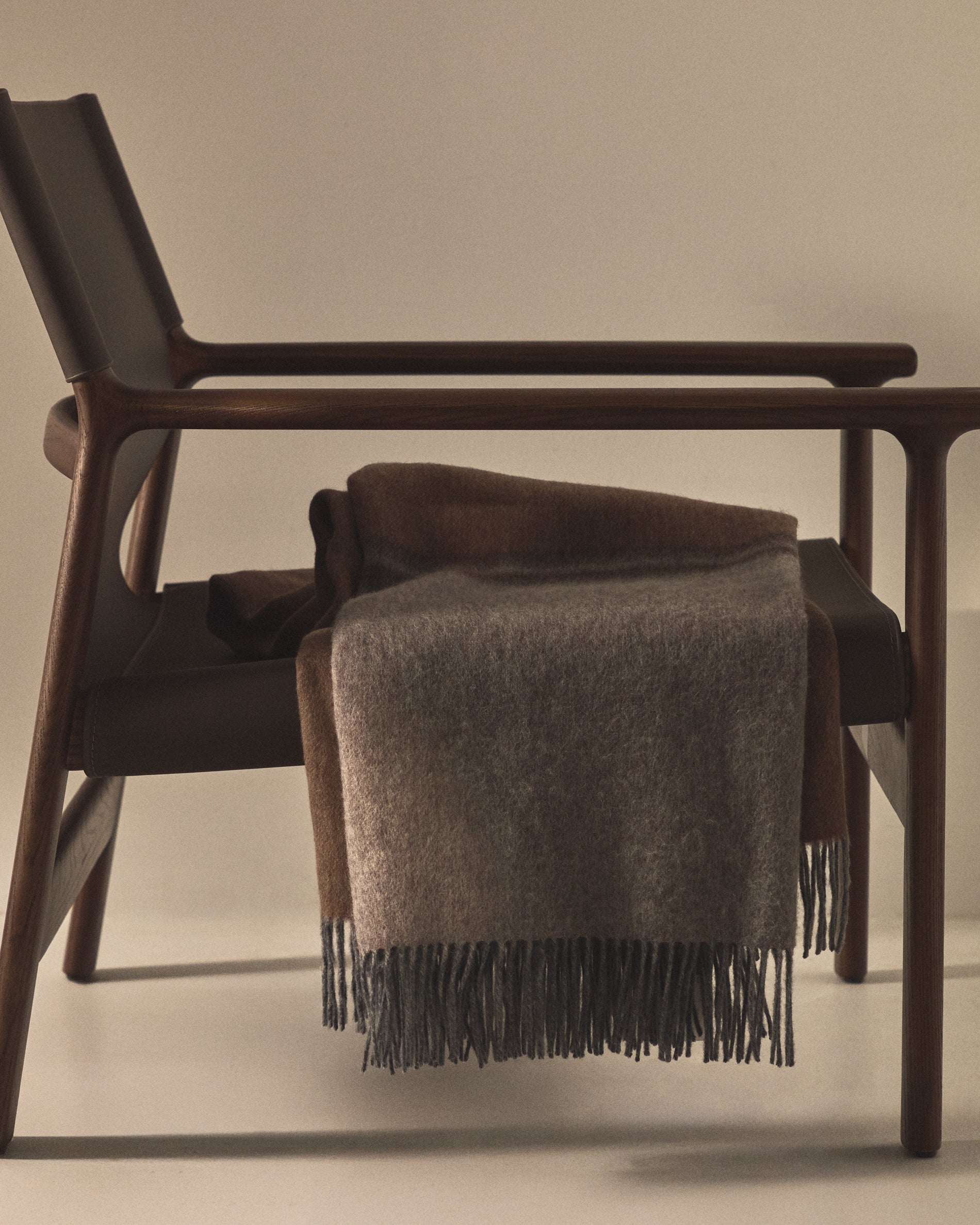 Zunara multicoloured double-sided wool blend blanket with fringing 170 x 130cm - Lifestyle