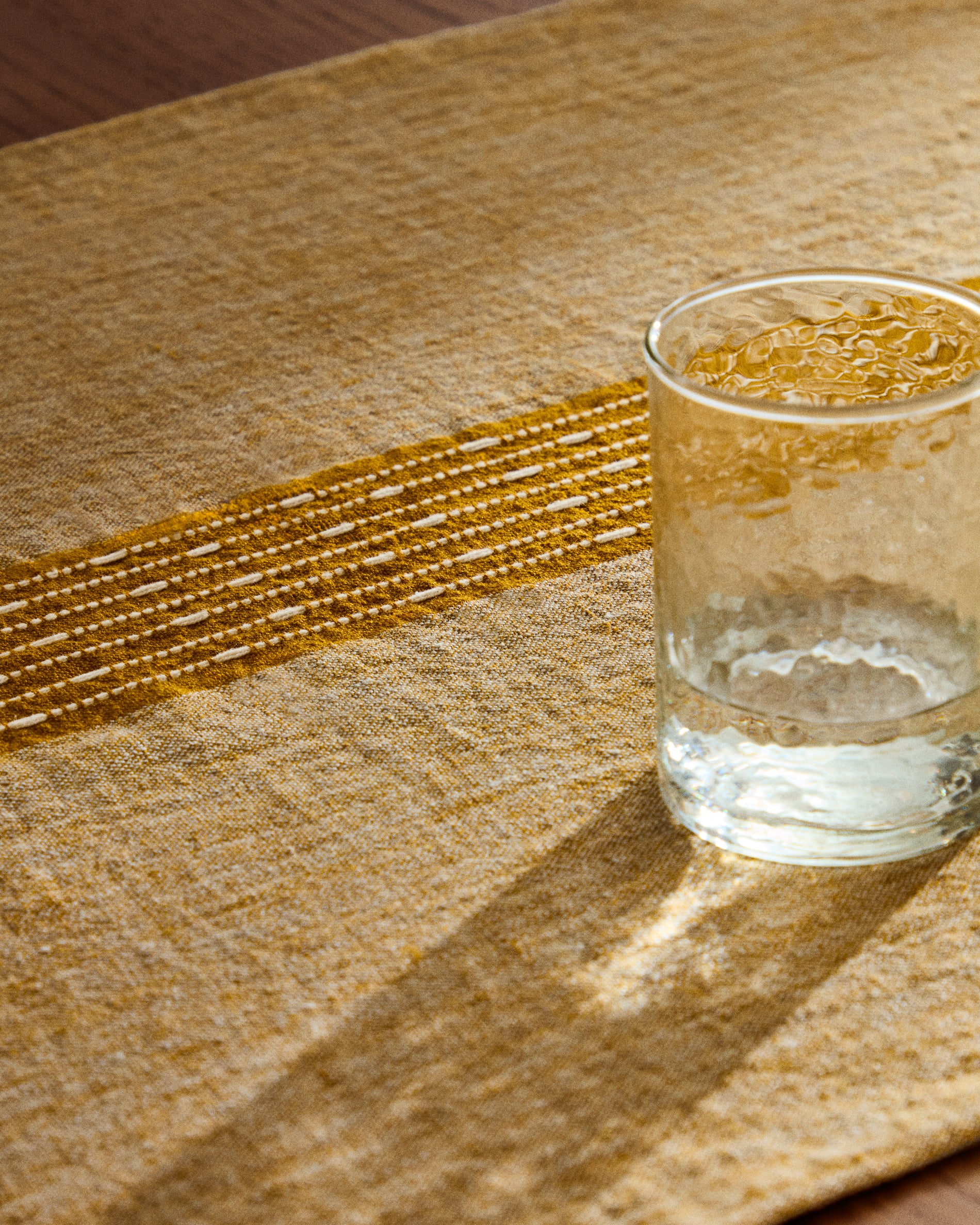 Calena linen jacquard table runner with mustard central stripe 50 x 150 cm - Lifestyle