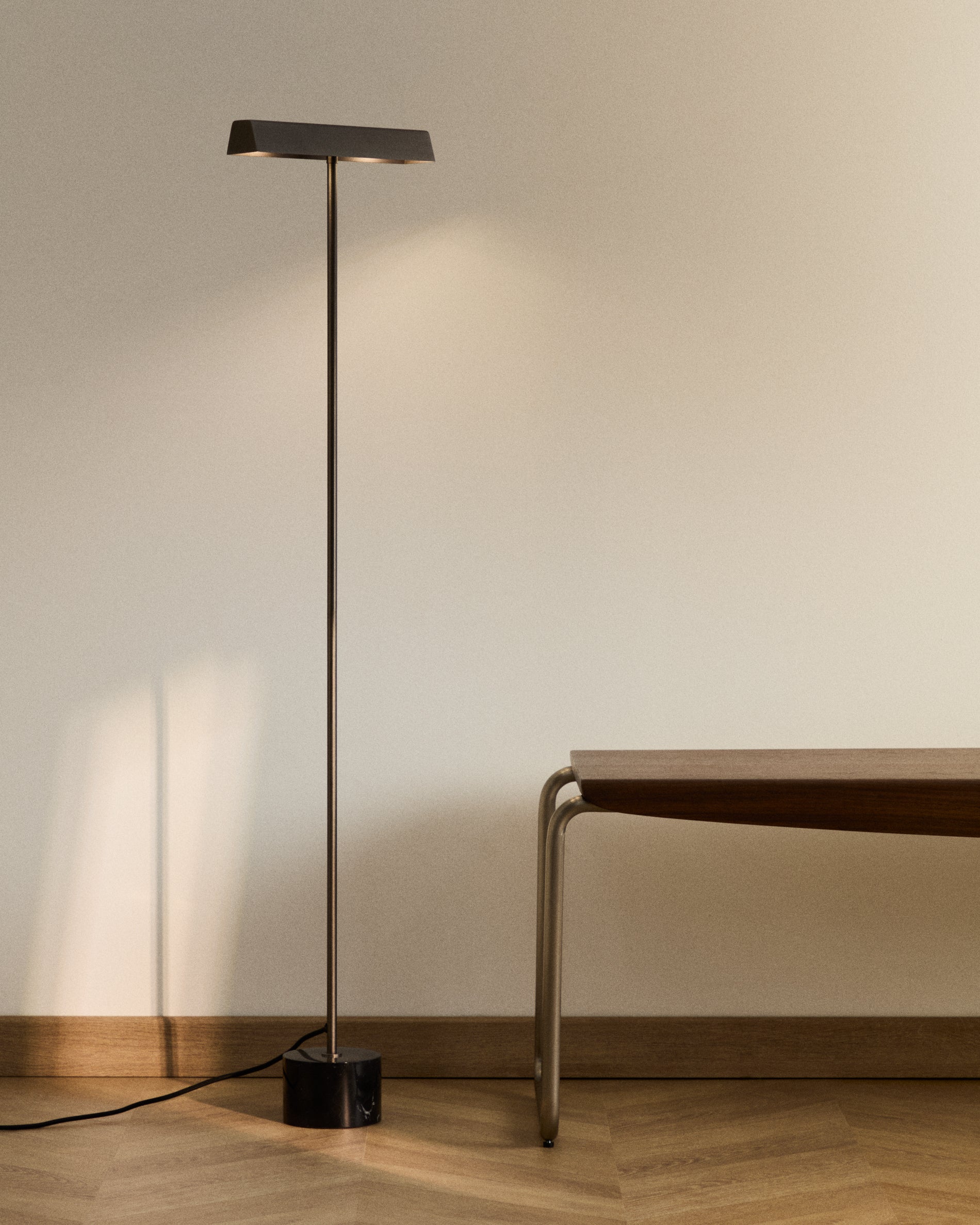 Lynor brushed metal floor lamp with black marble base - Lifestyle