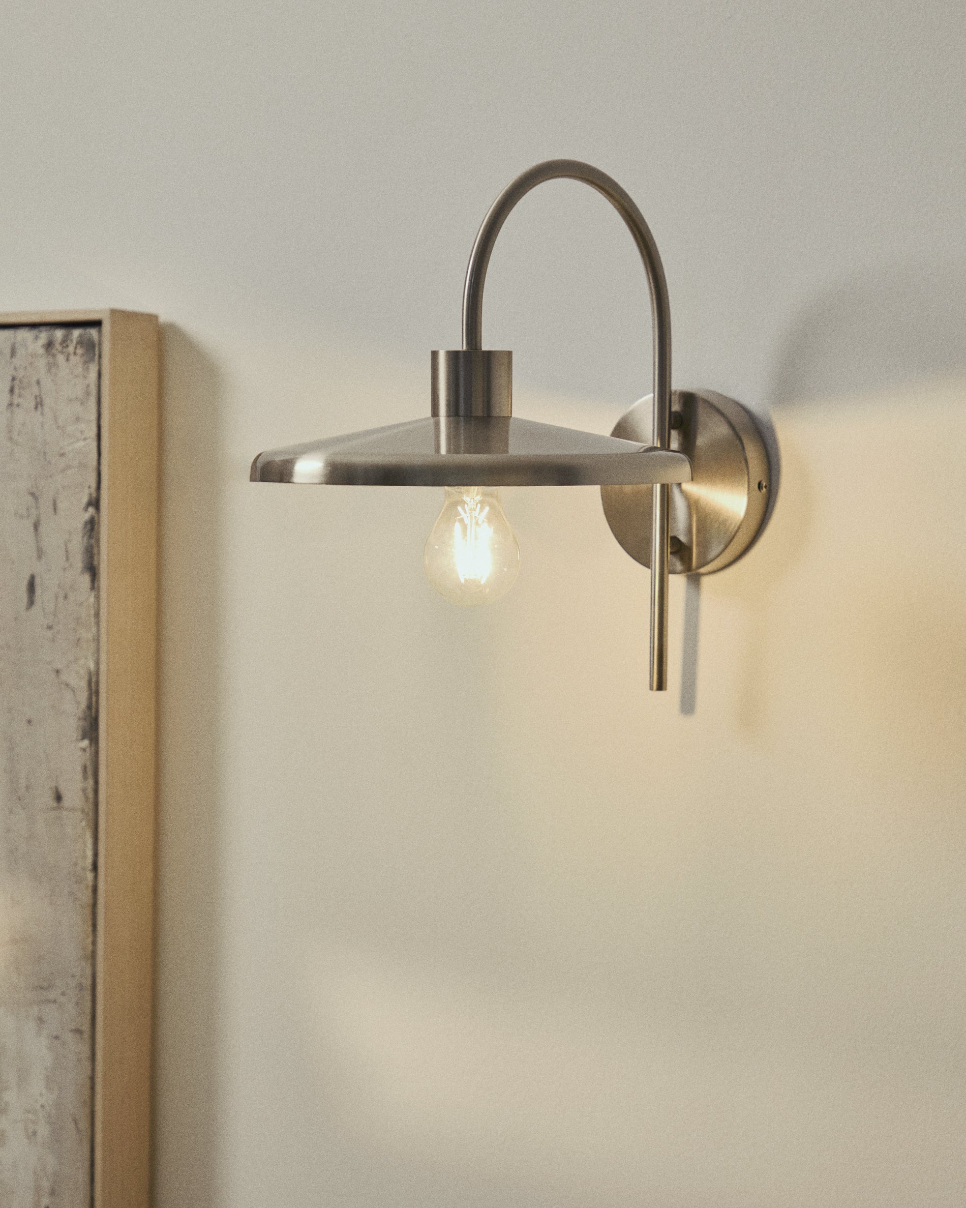 Nuvira wall light in light grey brushed metal - Lifestyle