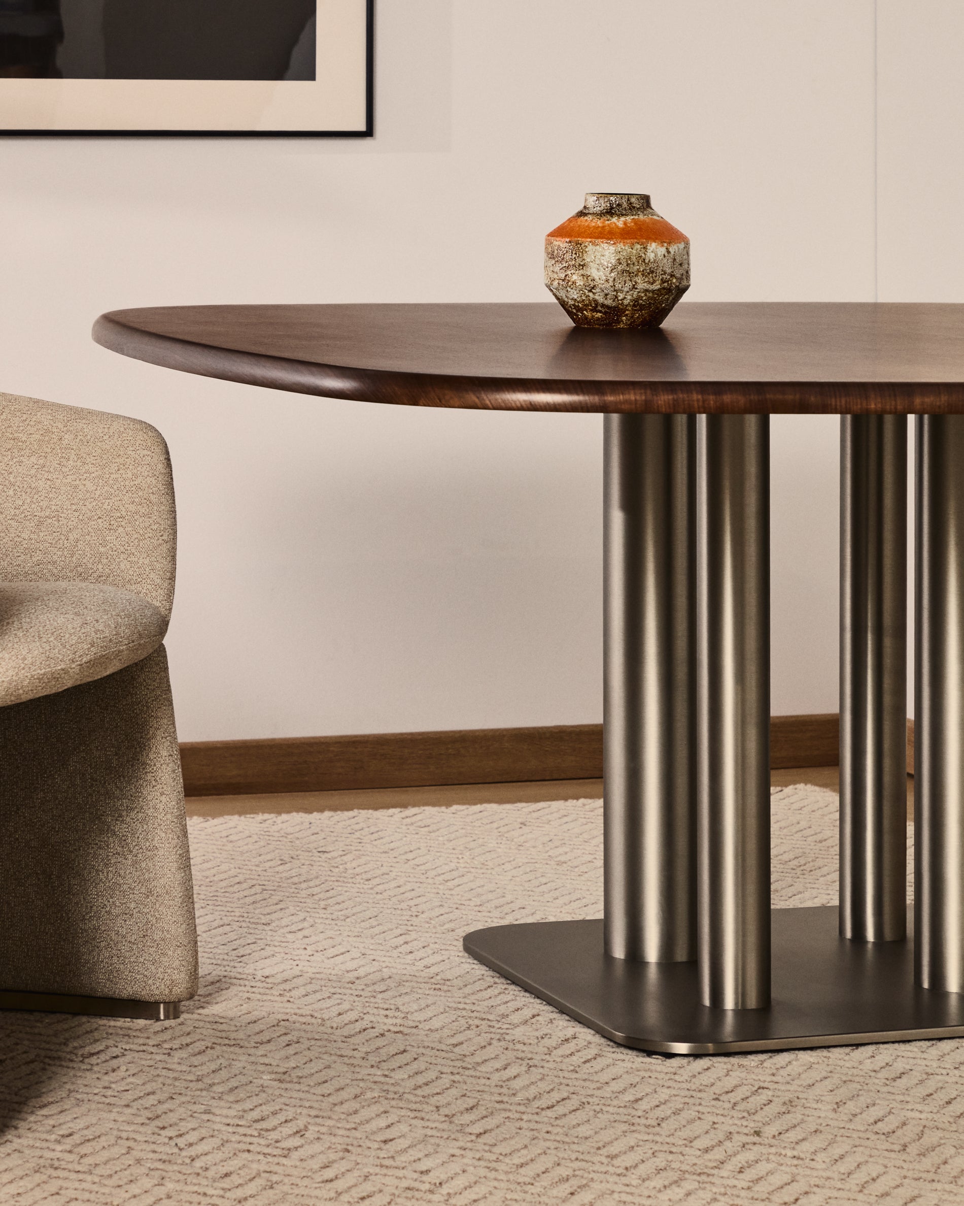 Melvar table made from walnut veneer and legs with brushed stainless steel base 150 x 150cm - Lifestyle