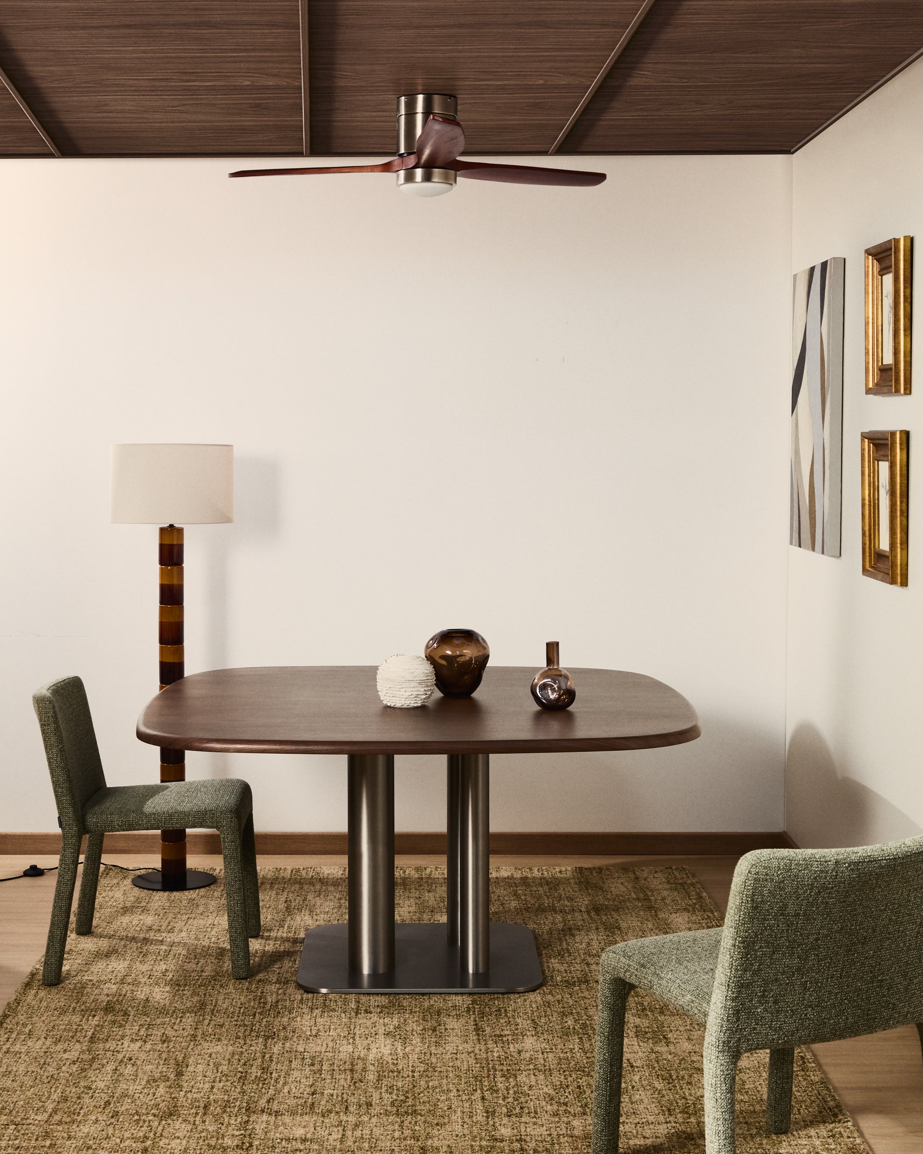 Melvar table made from walnut veneer and legs with brushed stainless steel base 121 x 121cm - Lifestyle