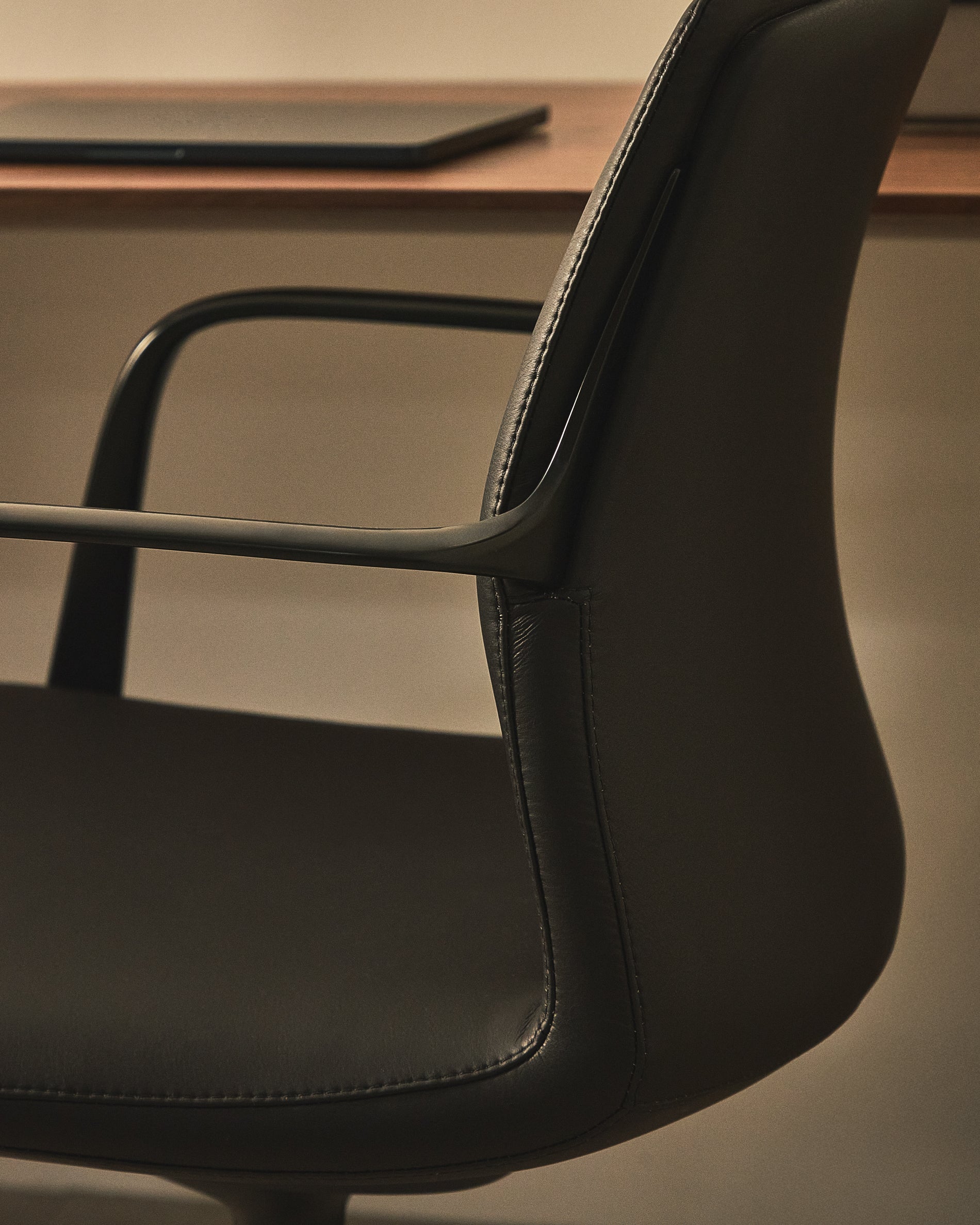 Nerlan desk chair in black faux leather with a black aluminium frame - Lifestyle