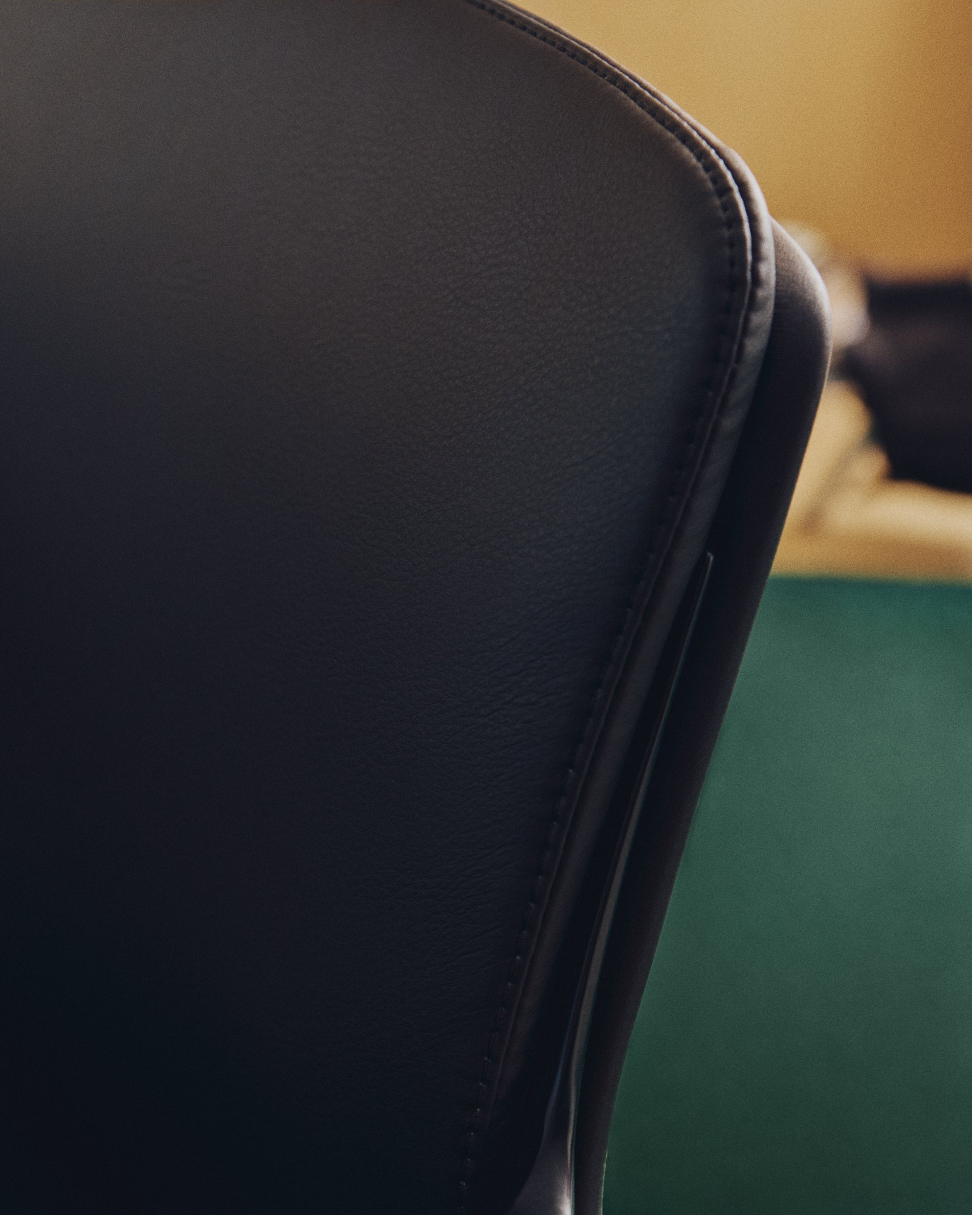 Nerlan desk chair in black faux leather with a black aluminium frame - Lifestyle