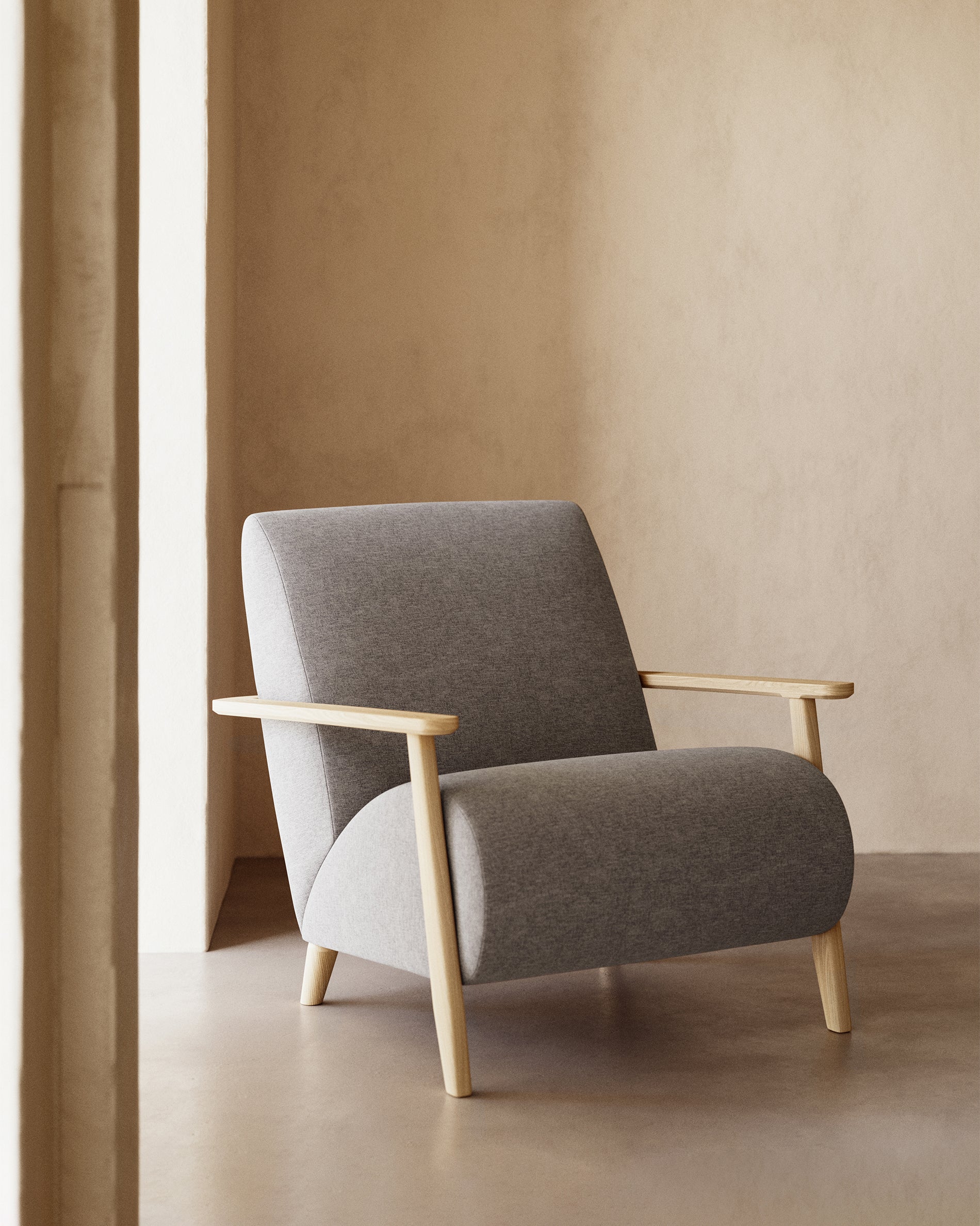 Meghan armchair in grey with solid ash legs with natural finish - Lifestyle