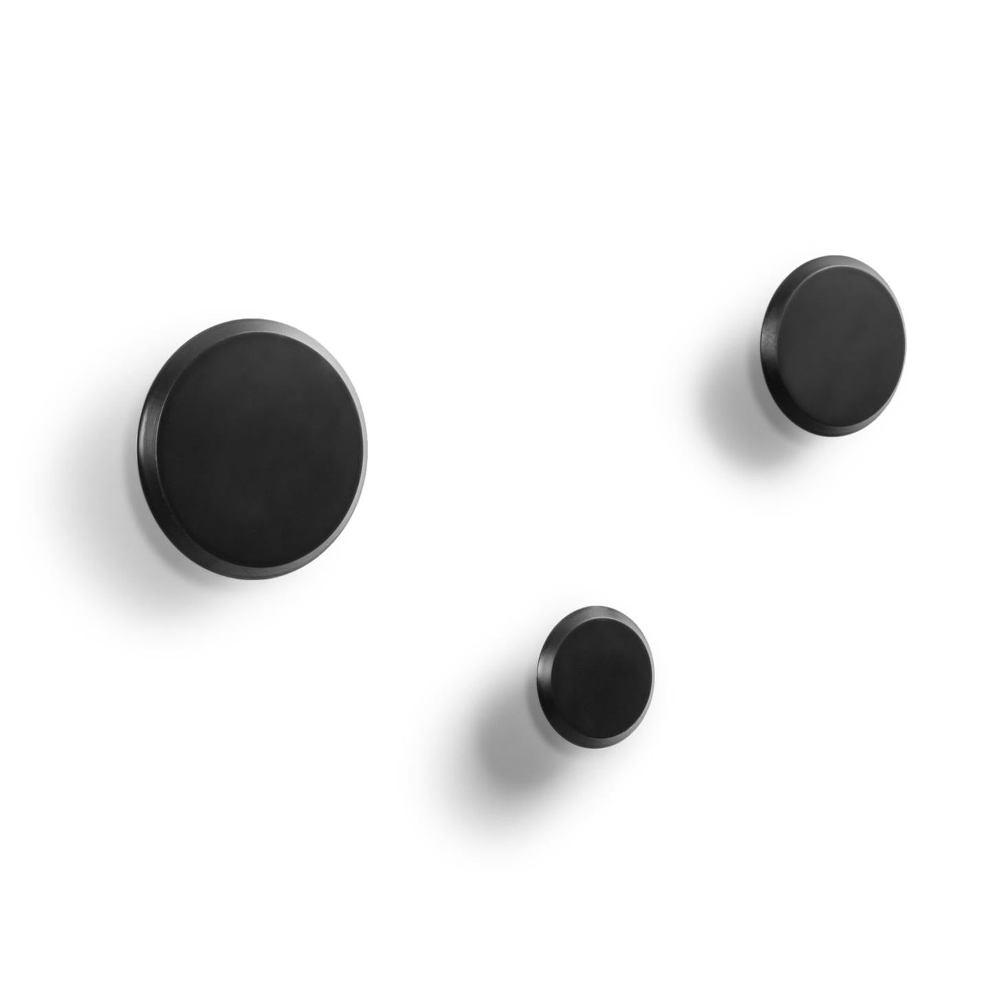 Set of 3 Nadua hangers in solid wood with a natural, black beech finish. - Product Image