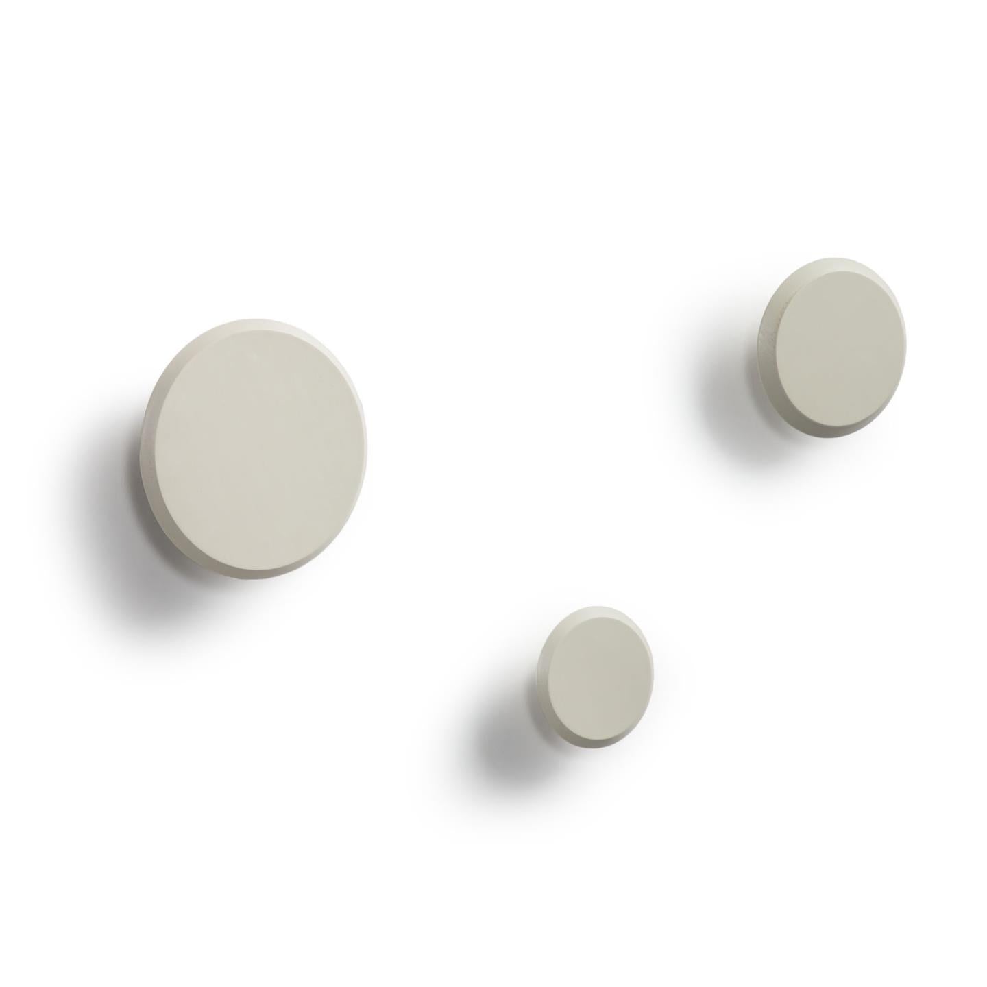 Set of 3 Nadua hangers in solid wood with a natural, beige beech finish. - Product Image