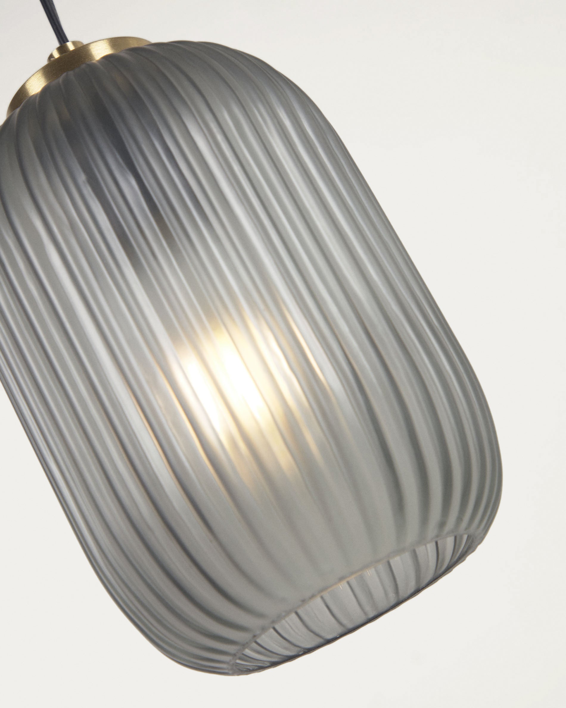 Hestia metal ceiling light with brass finish and grey glass - Detail
