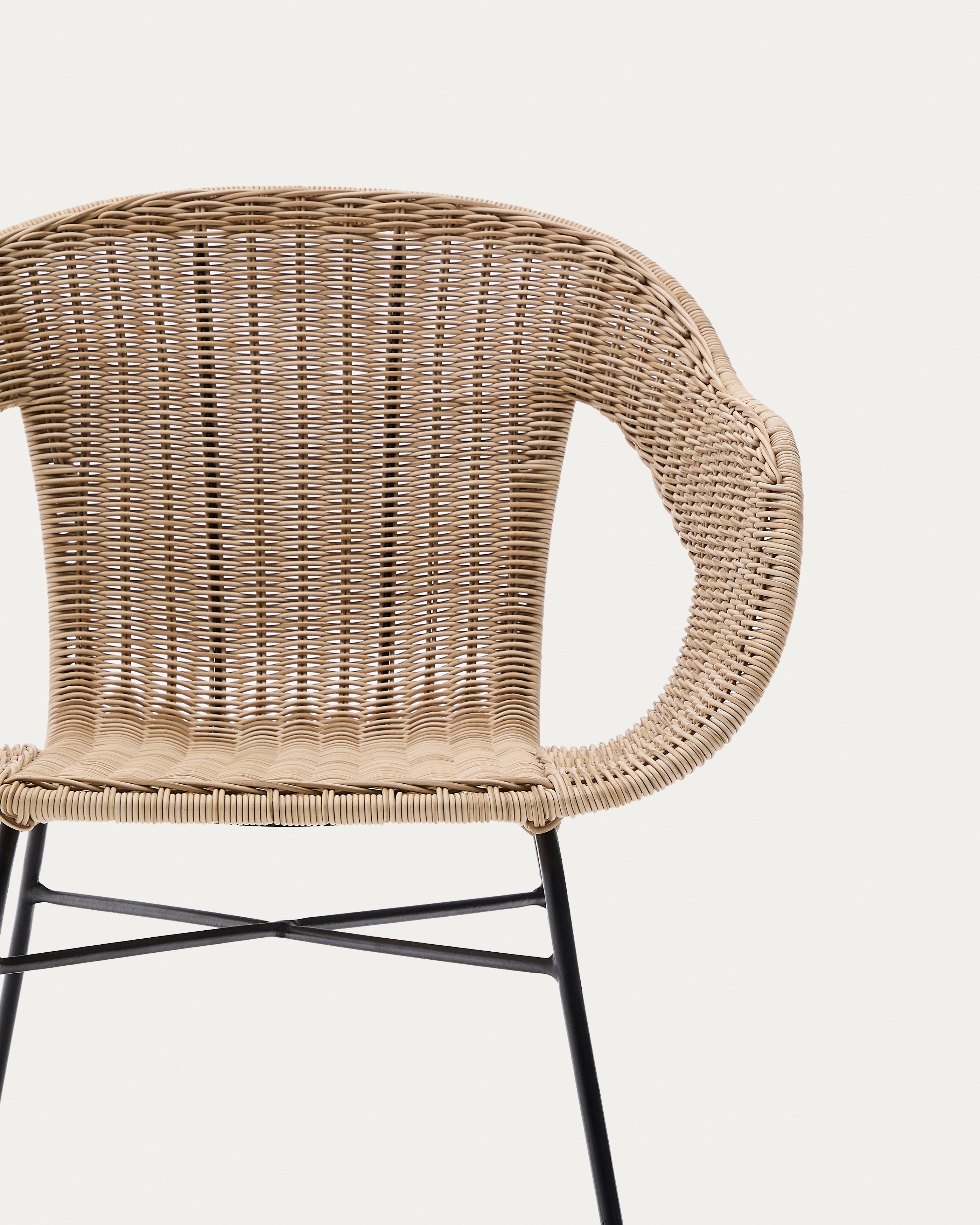 Eltiera stackable chair made of synthetic rattan with black steel structure