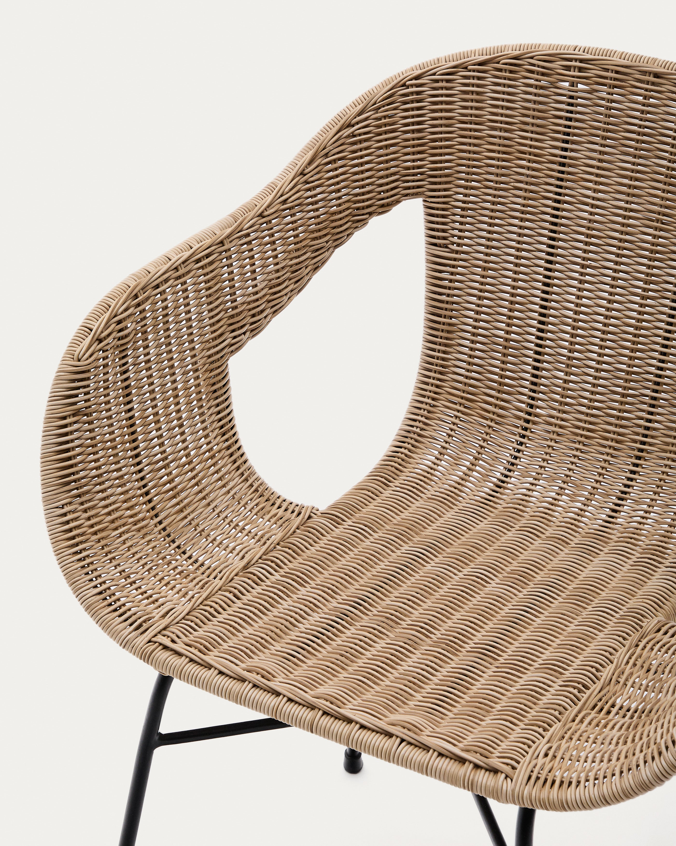 Eltiera stackable chair made of synthetic rattan with black steel structure