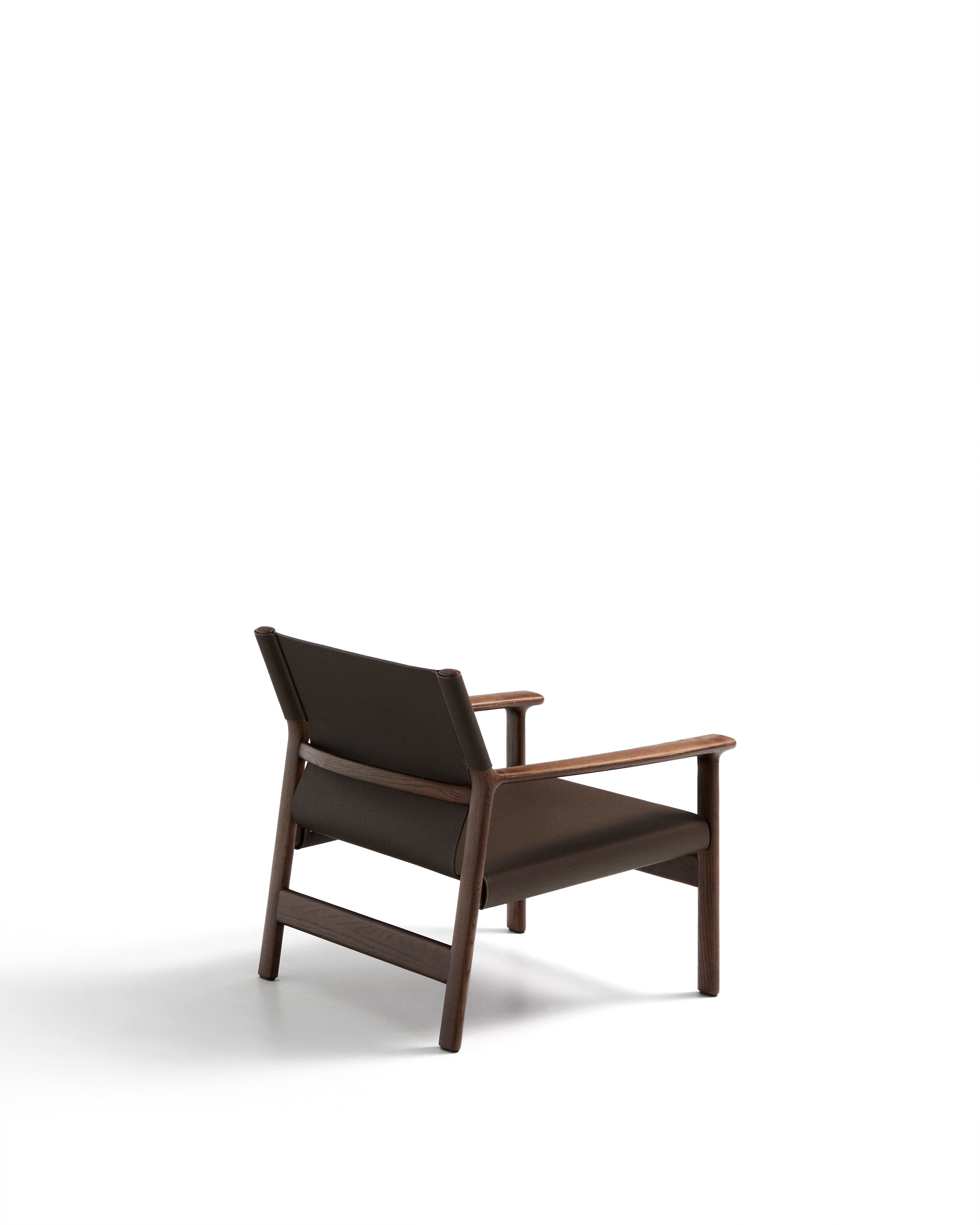 Jan armchair made of dark brown recycled leather fibres and FSC 100% solid ash wood with walnut-coloured finish - Product Image