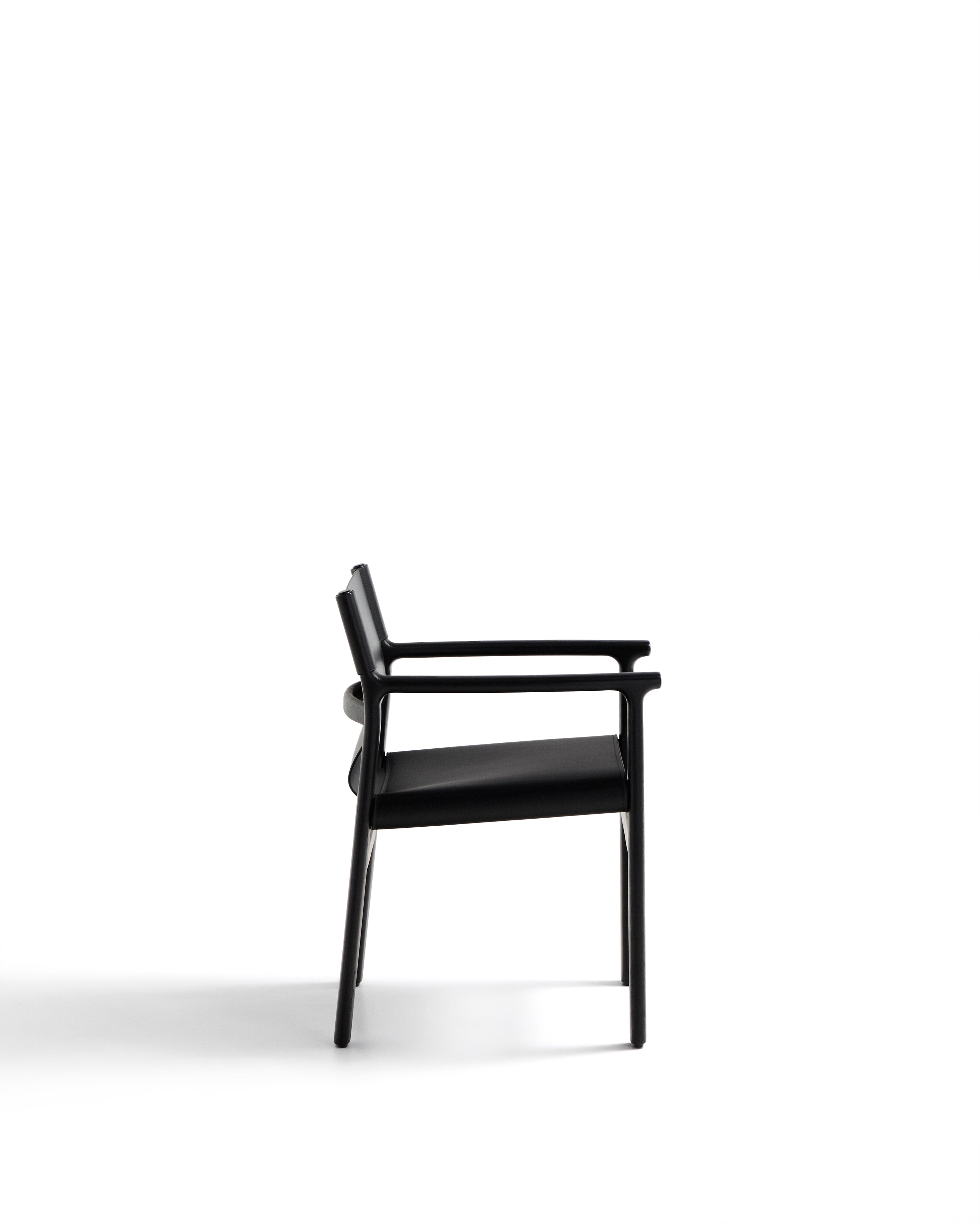 Jan chair made of black recycled leather fibres and FSC 100% solid ash wood with black finish - Product Image