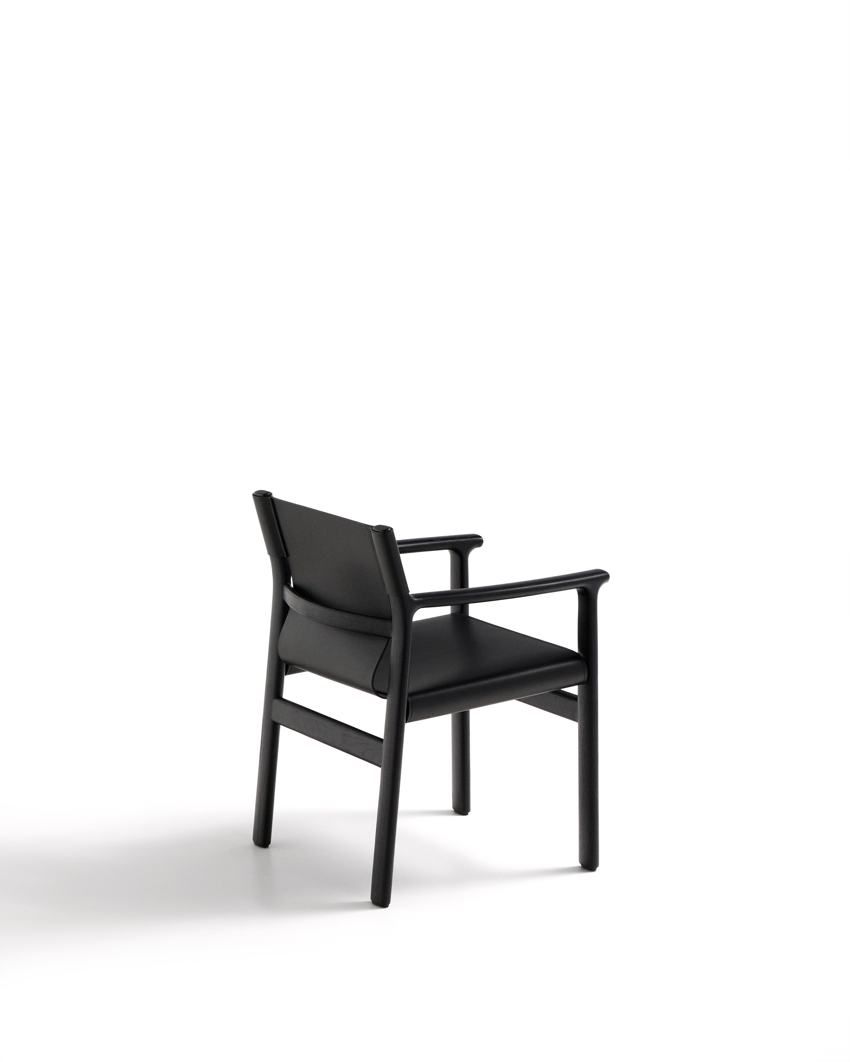 Jan chair made of black recycled leather fibres and FSC 100% solid ash wood with black finish - Product Image