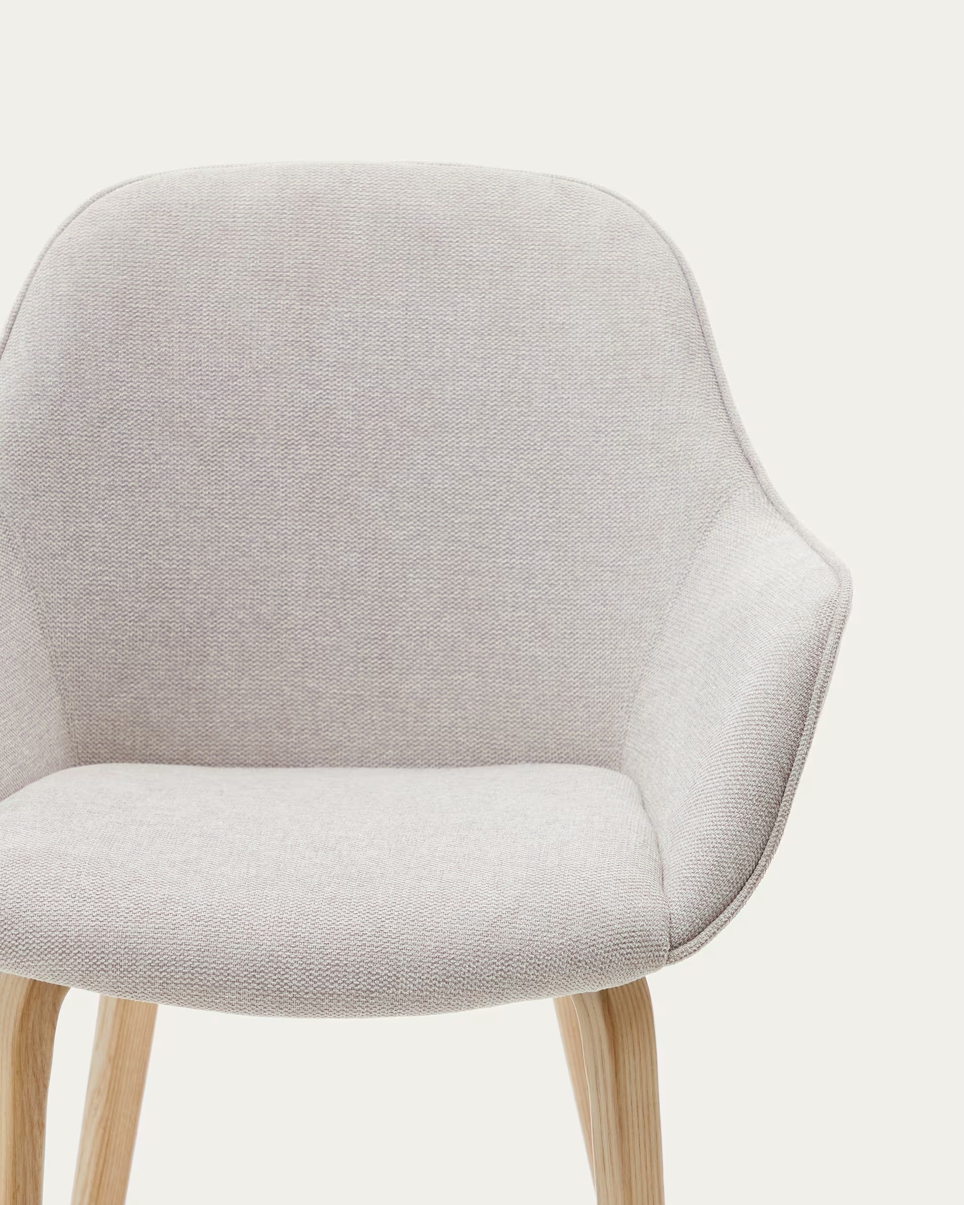 Aleli chair in beige shearling with solid ash wood legs and natural finish