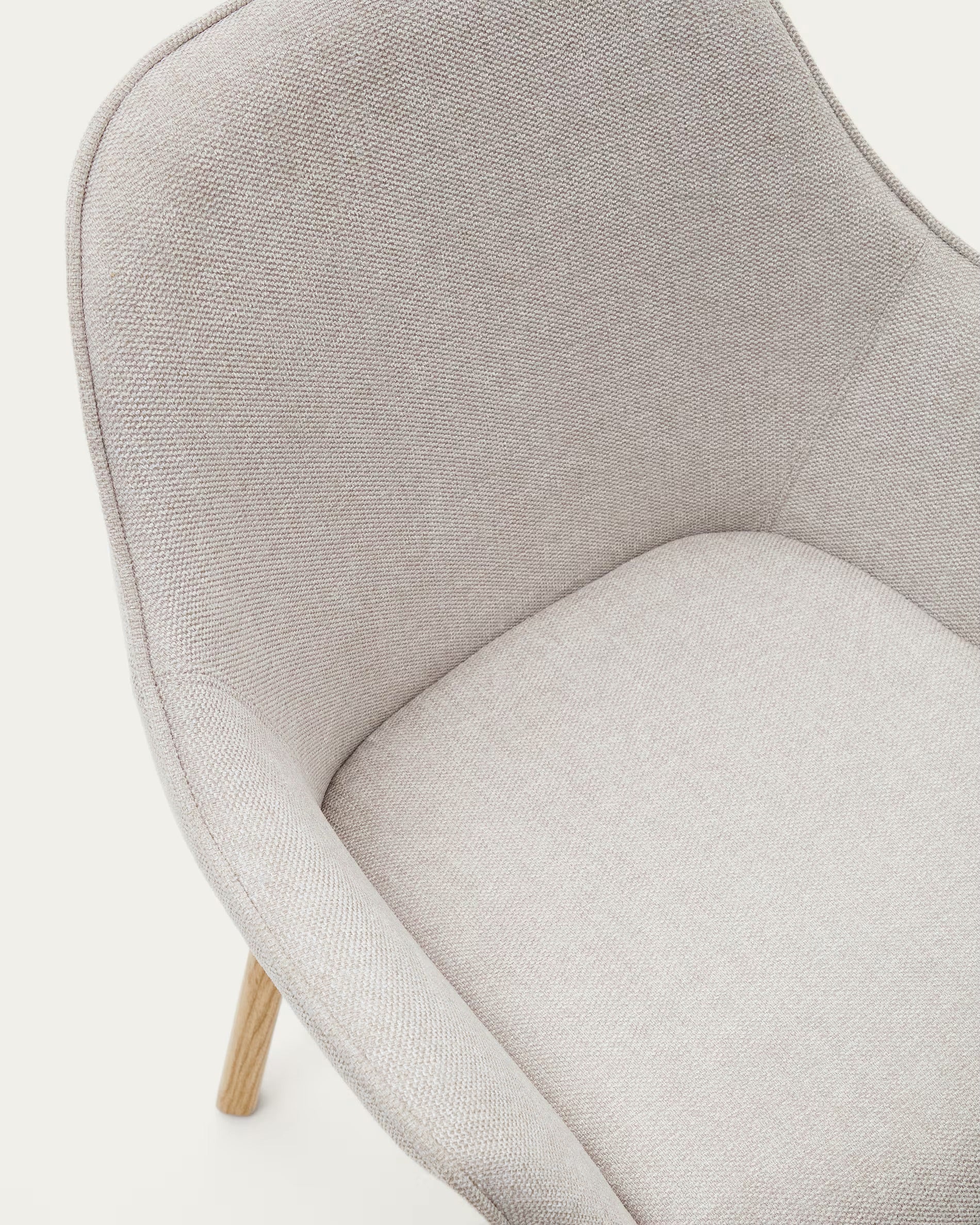 Aleli chair in beige shearling with solid ash wood legs and natural finish