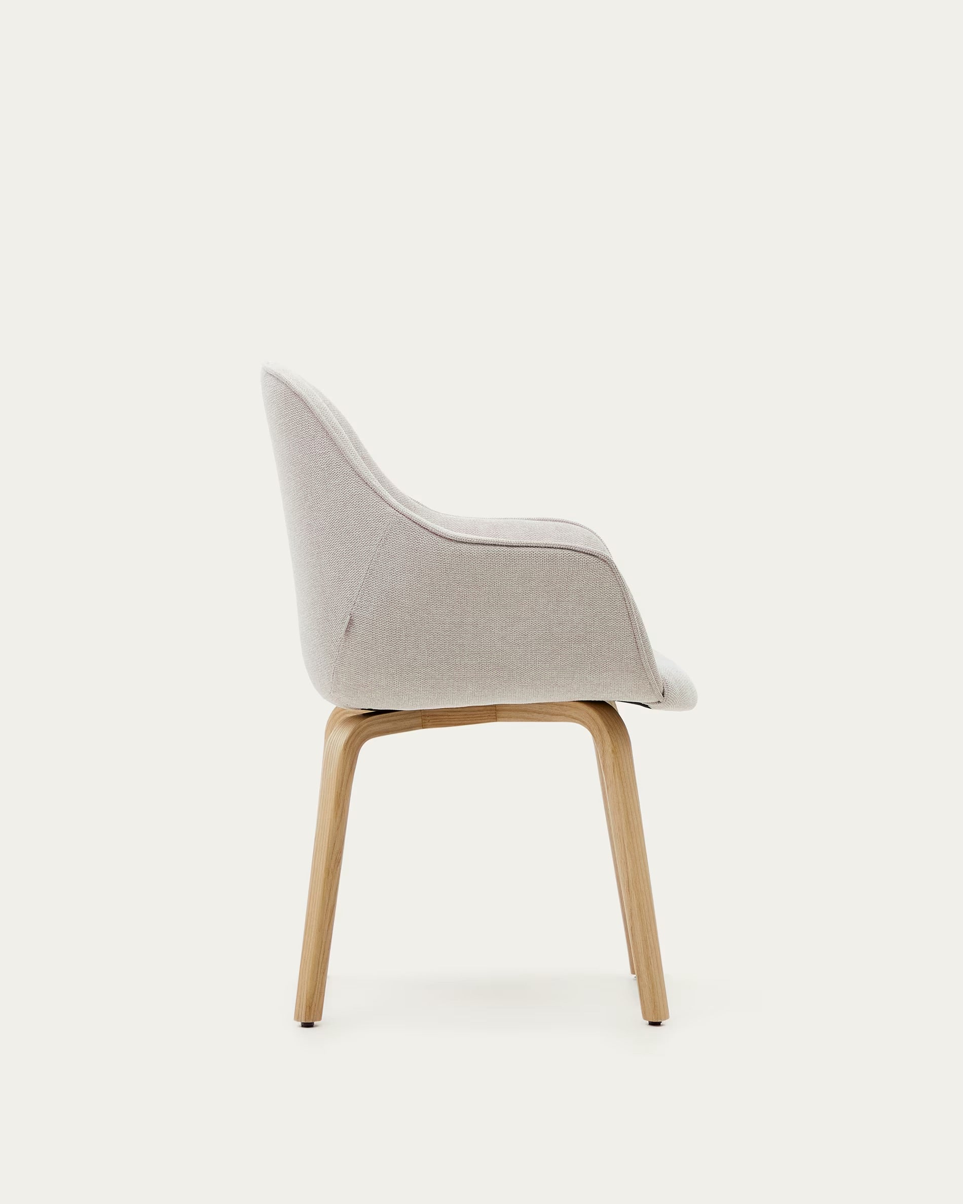 Aleli chair in beige shearling with solid ash wood legs and natural finish