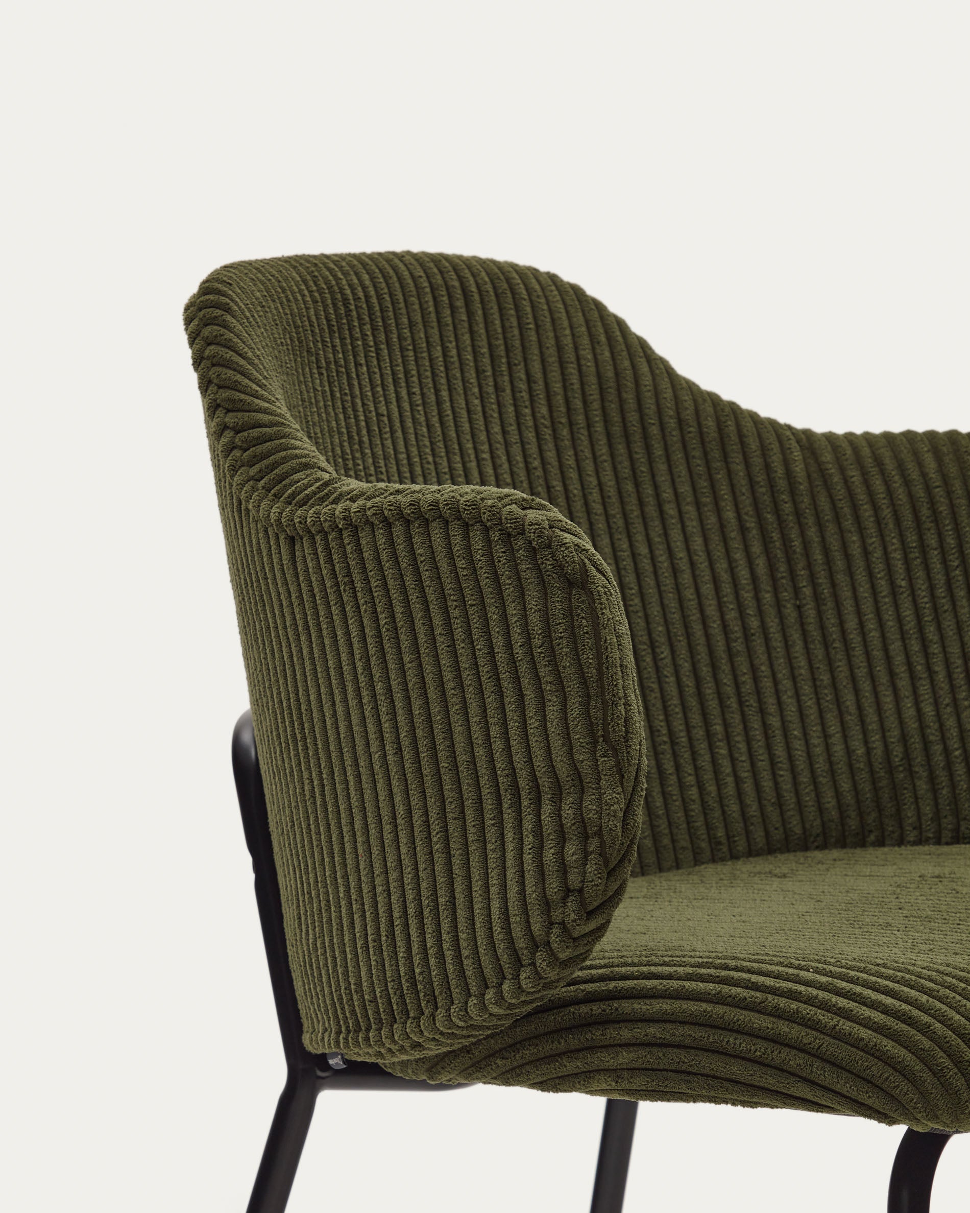 Yunia chair in green wide seam corduroy with steel legs in a painted black finish FR - Detail
