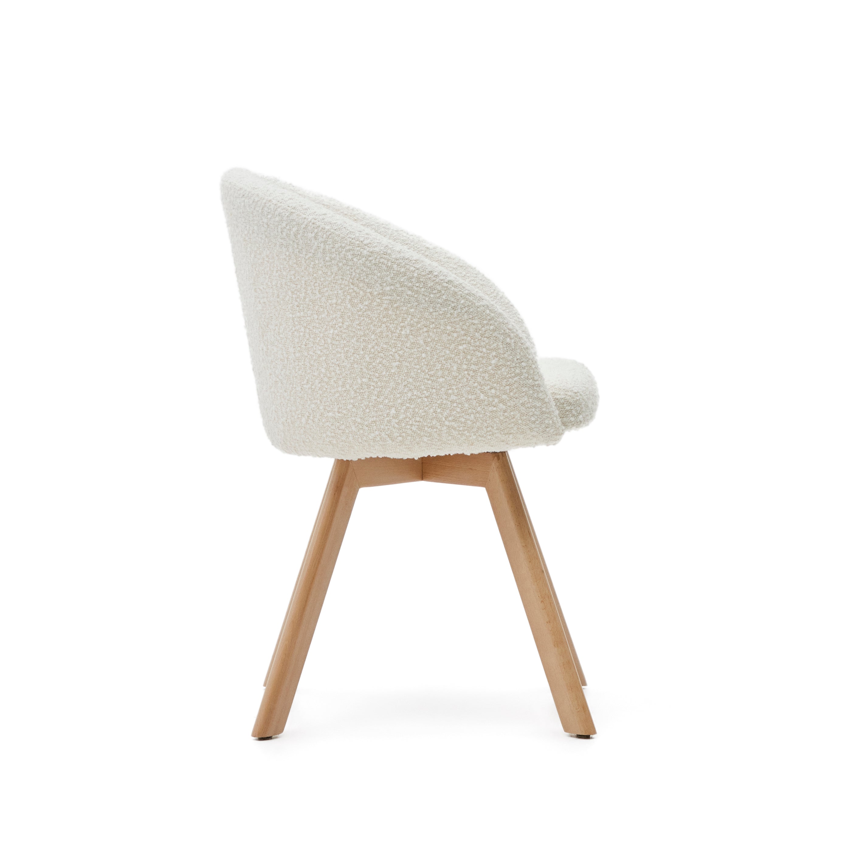 Marvin swivel chair in white bouclé with solid beech wood legs in a natural finish