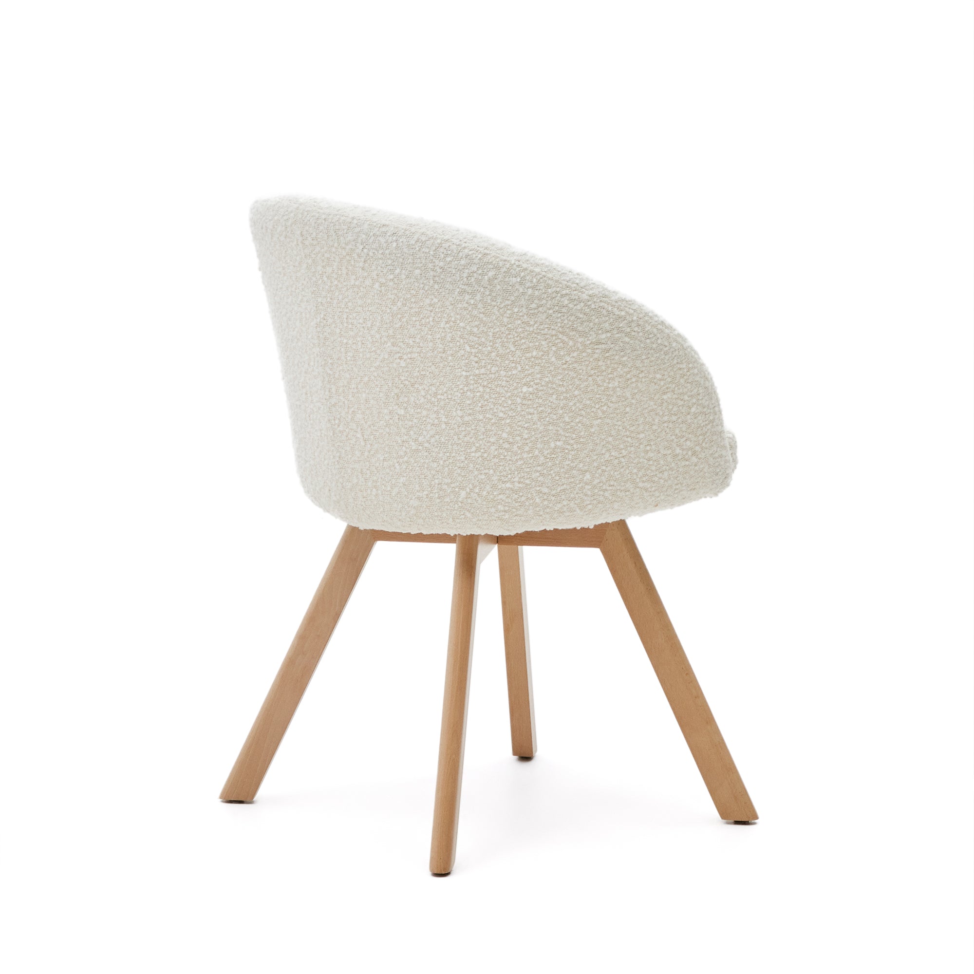 Marvin swivel chair in white bouclé with solid beech wood legs in a natural finish