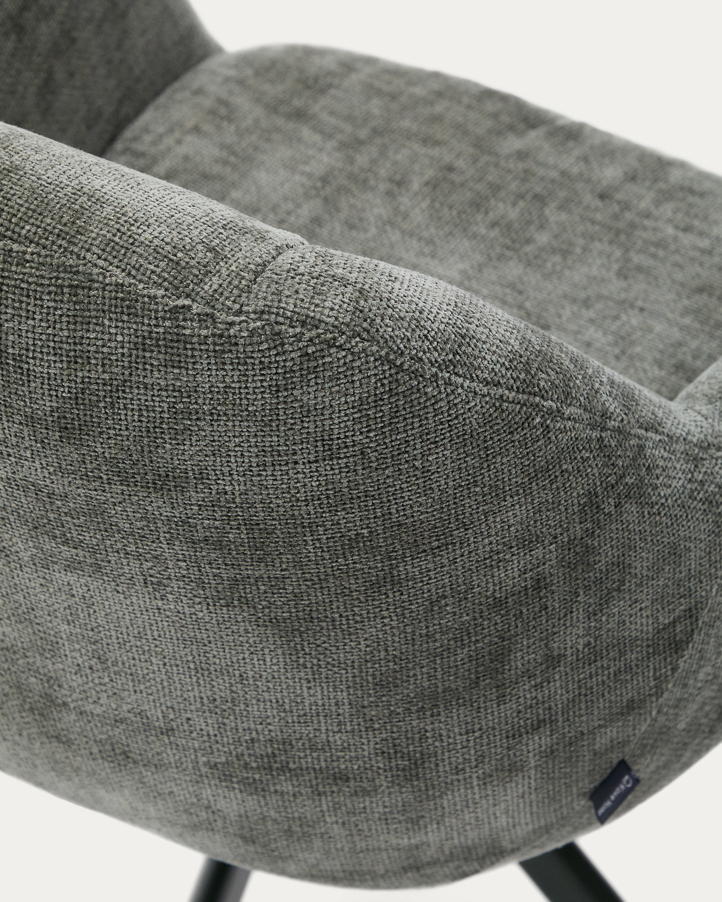 Dorina swivel chair in green chenille and steel legs in a green finish - Detail