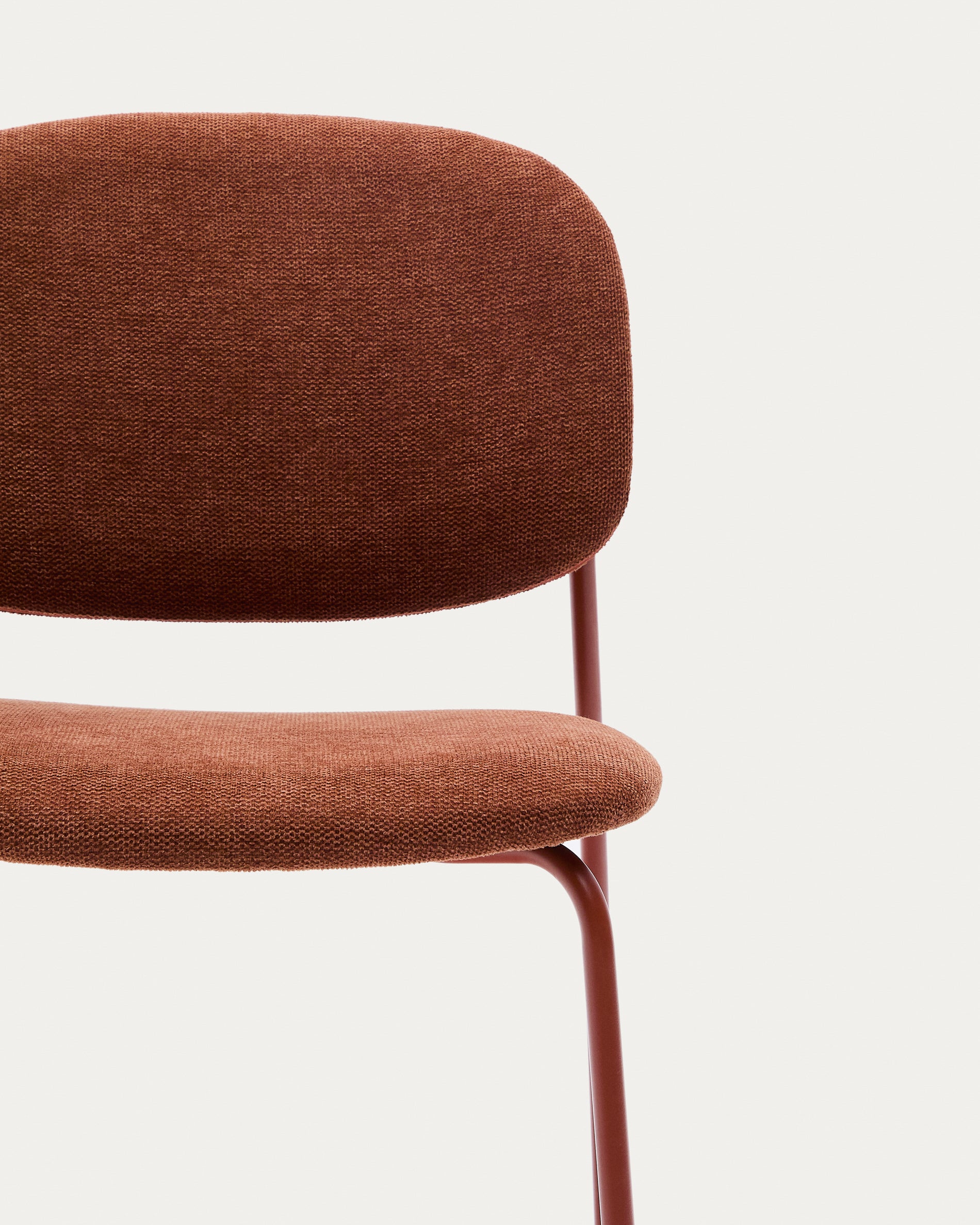 Meli stackable chair in terracotta chenille with terracotta metal legs FSC Mix Credit - Detail