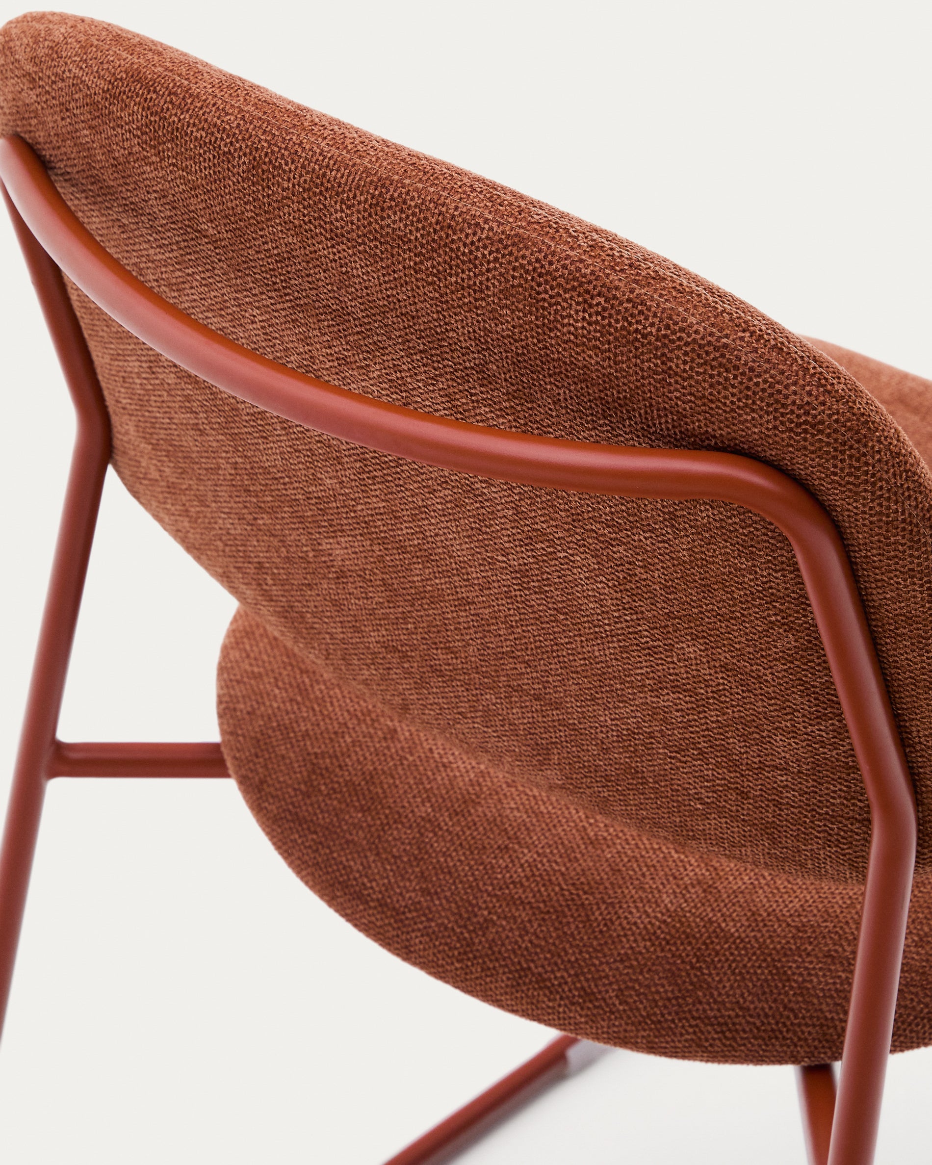 Meli stackable chair in terracotta chenille with terracotta metal legs FSC Mix Credit - Detail
