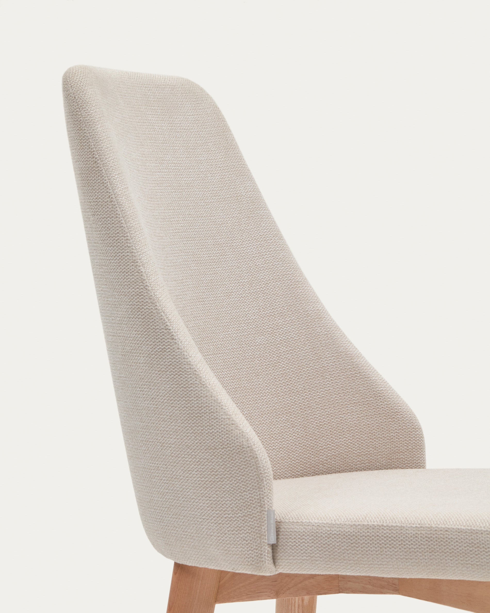 Rosie chair in beige chenille with solid ash wood legs in a natural finish - Detail