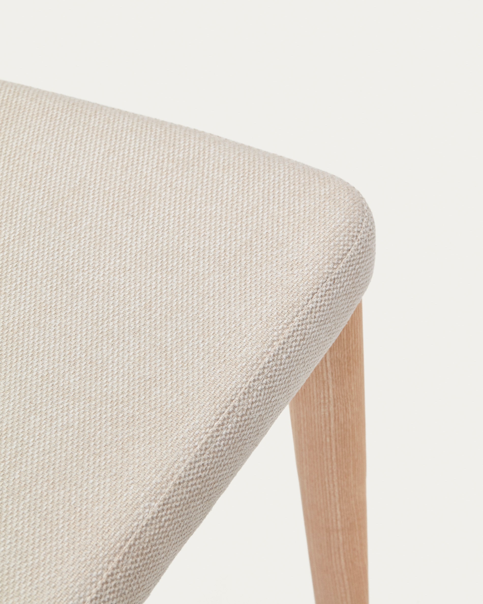 Rosie chair in beige chenille with solid ash wood legs in a natural finish - Detail