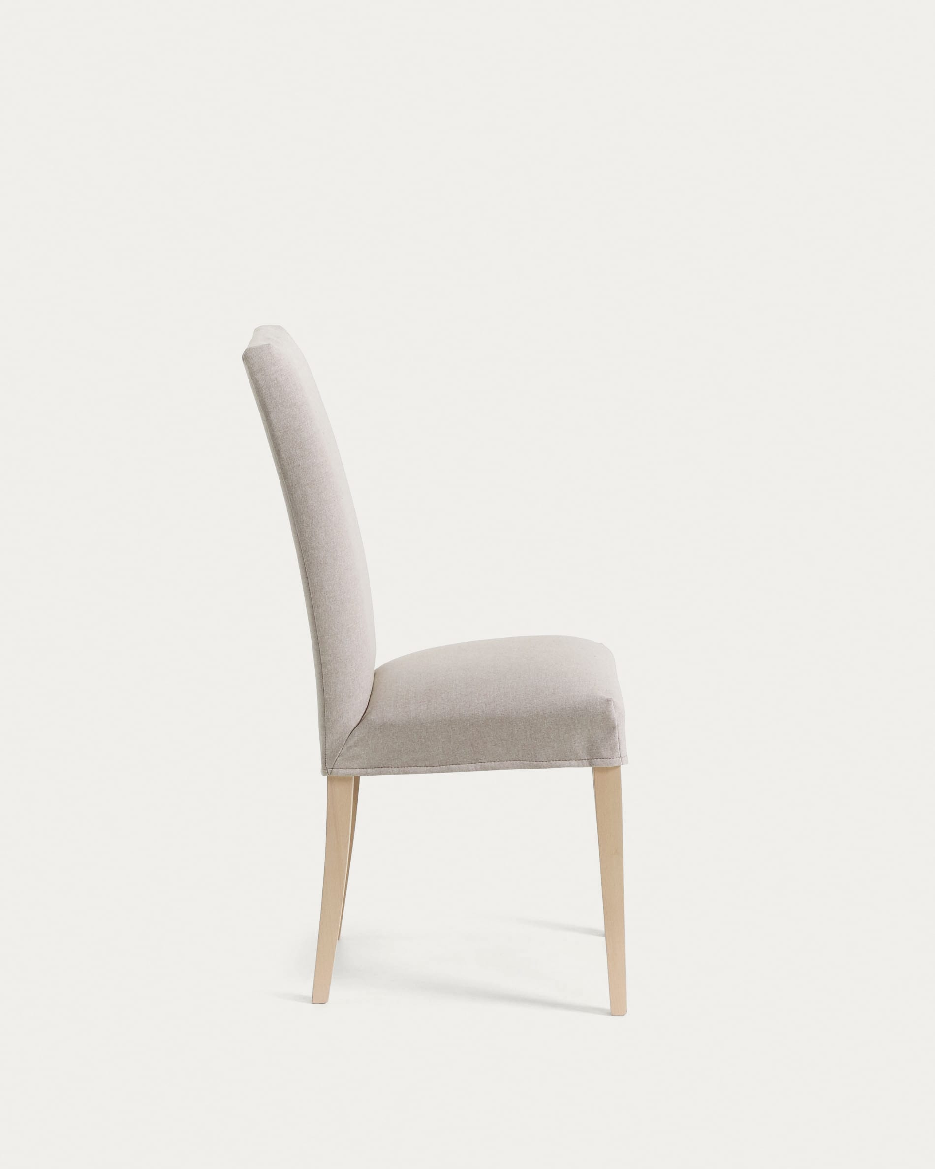 Beige Freda chair with solid beechwood legs in a natural finish