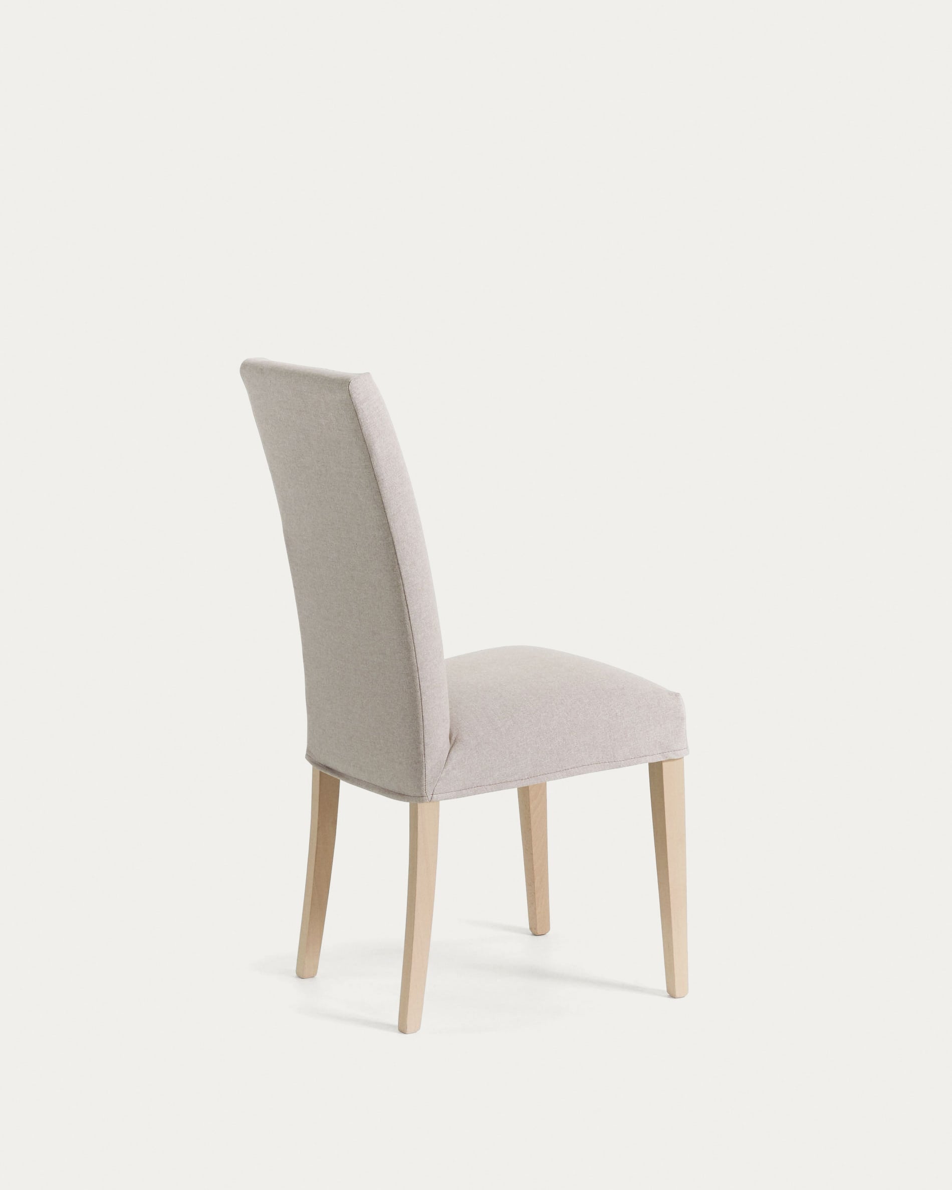 Beige Freda chair with solid beechwood legs in a natural finish