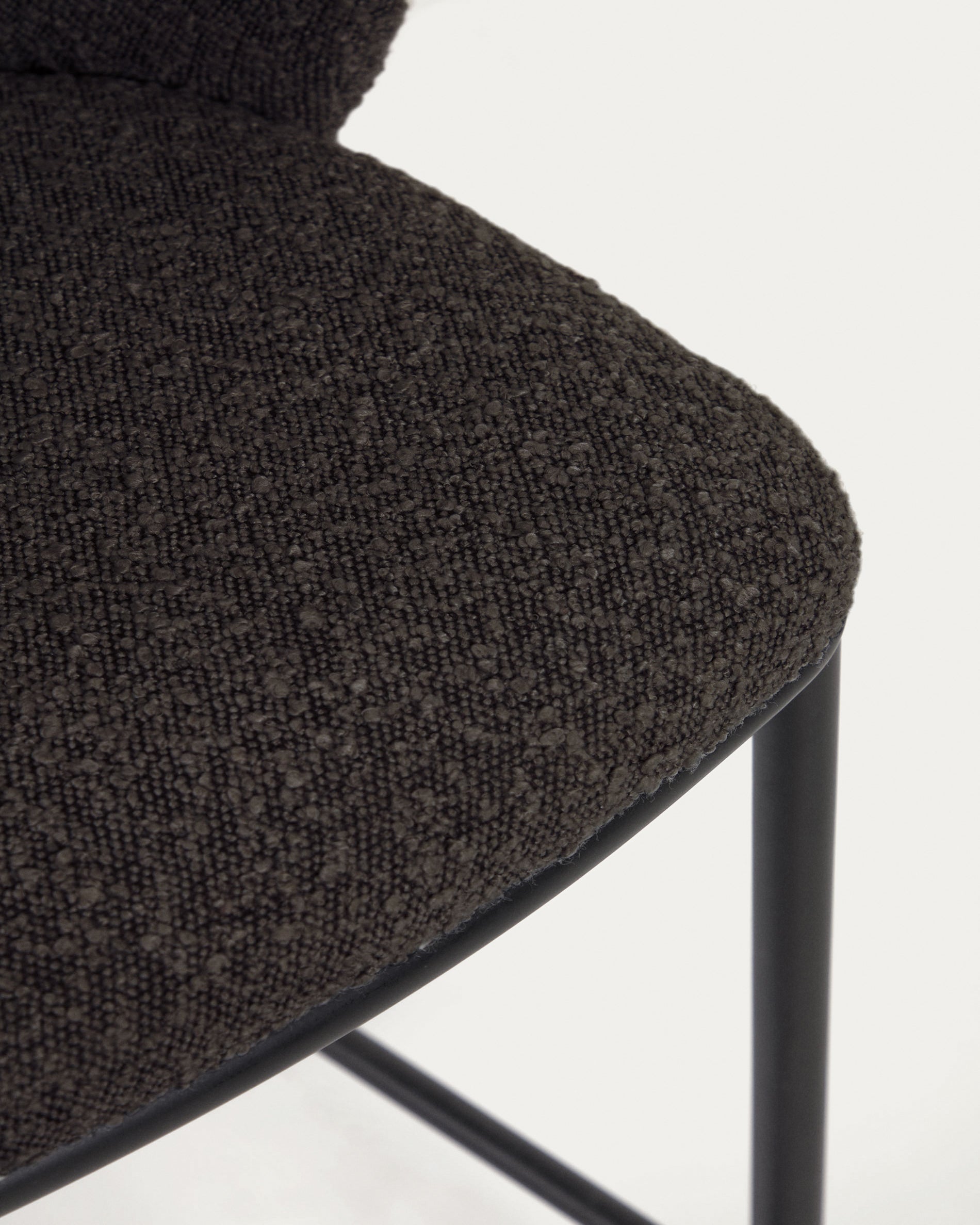 Ciselia stool with black bouclé and black steel legs, height 65 cm FSC Mix Credit - Detail