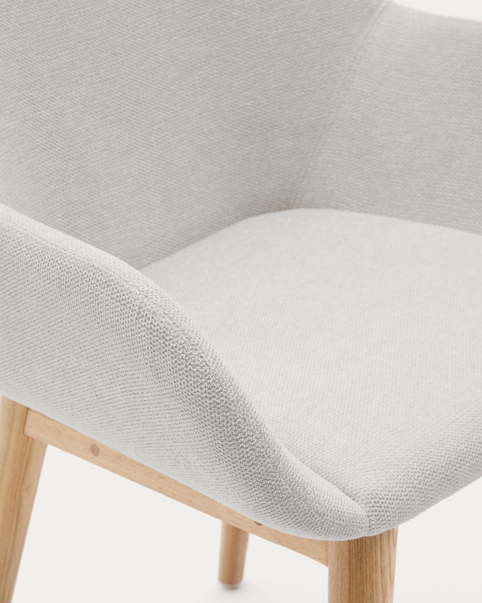 Konna chair in beige color with natural finished solid ash wood legs