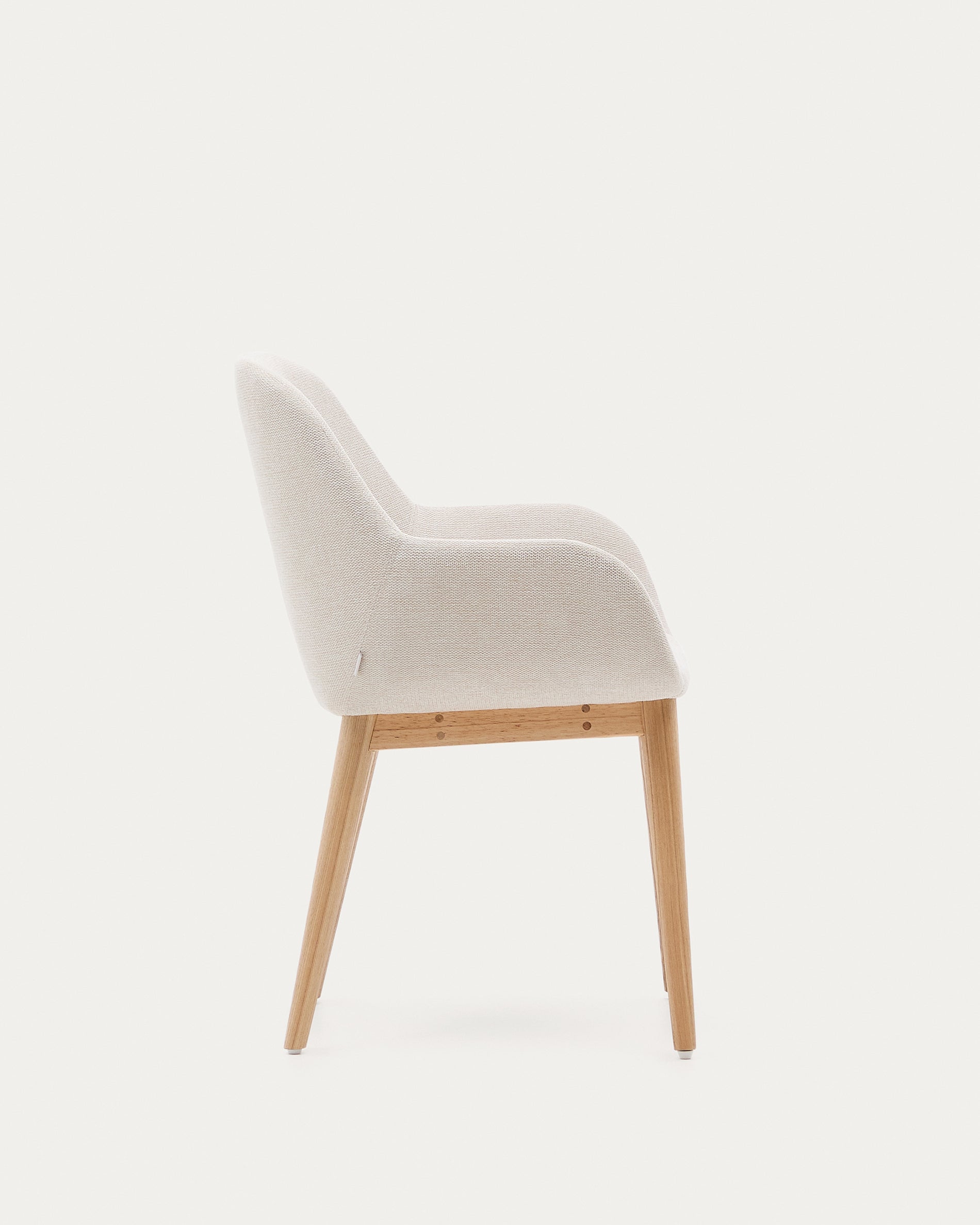 Konna chair in beige with solid ash wood legs in a natural finish - Product View