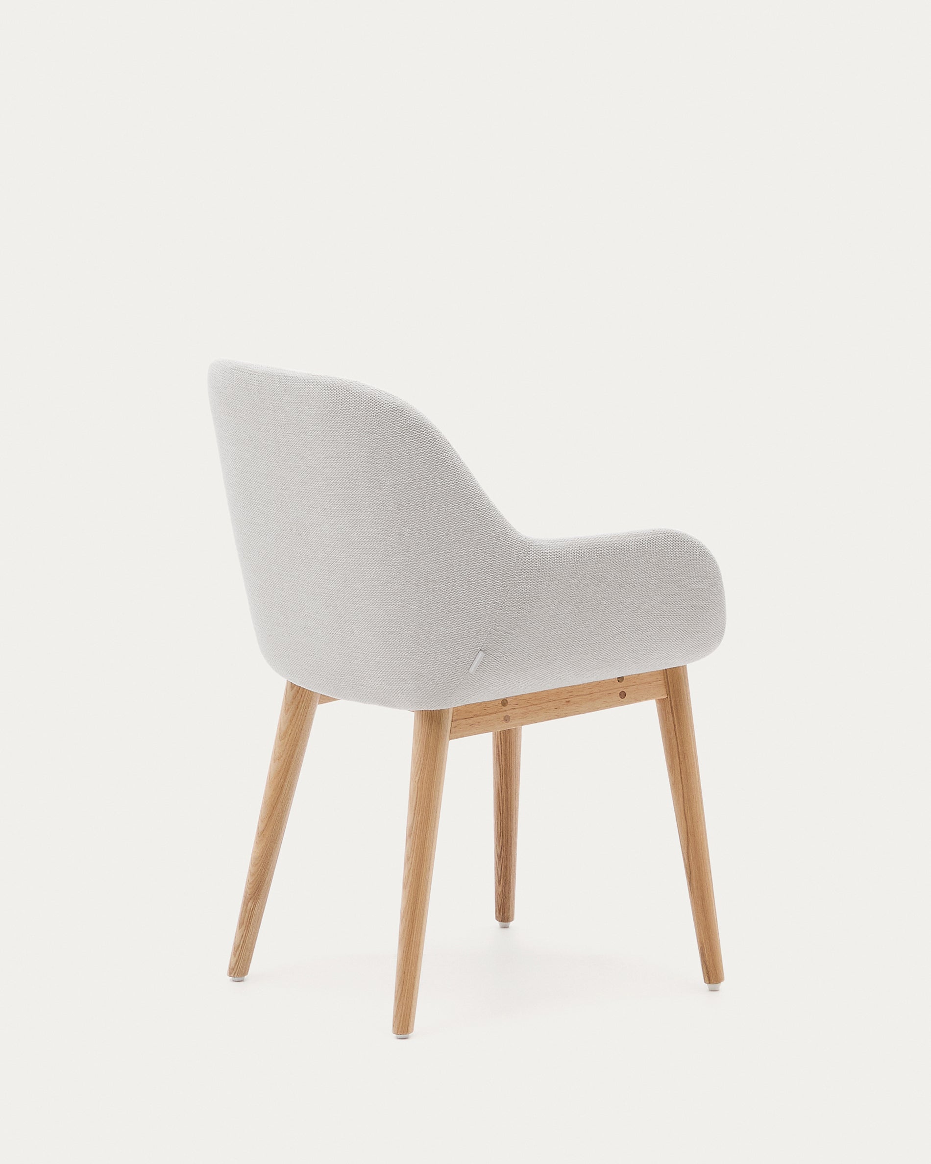 Konna chair in beige color with natural finished solid ash wood legs