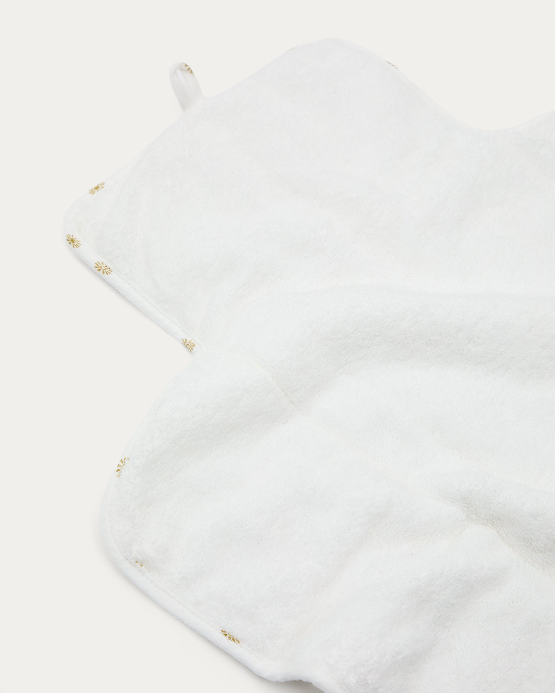 Olna travel changing mat in 100% cotton with a sun print - Detail