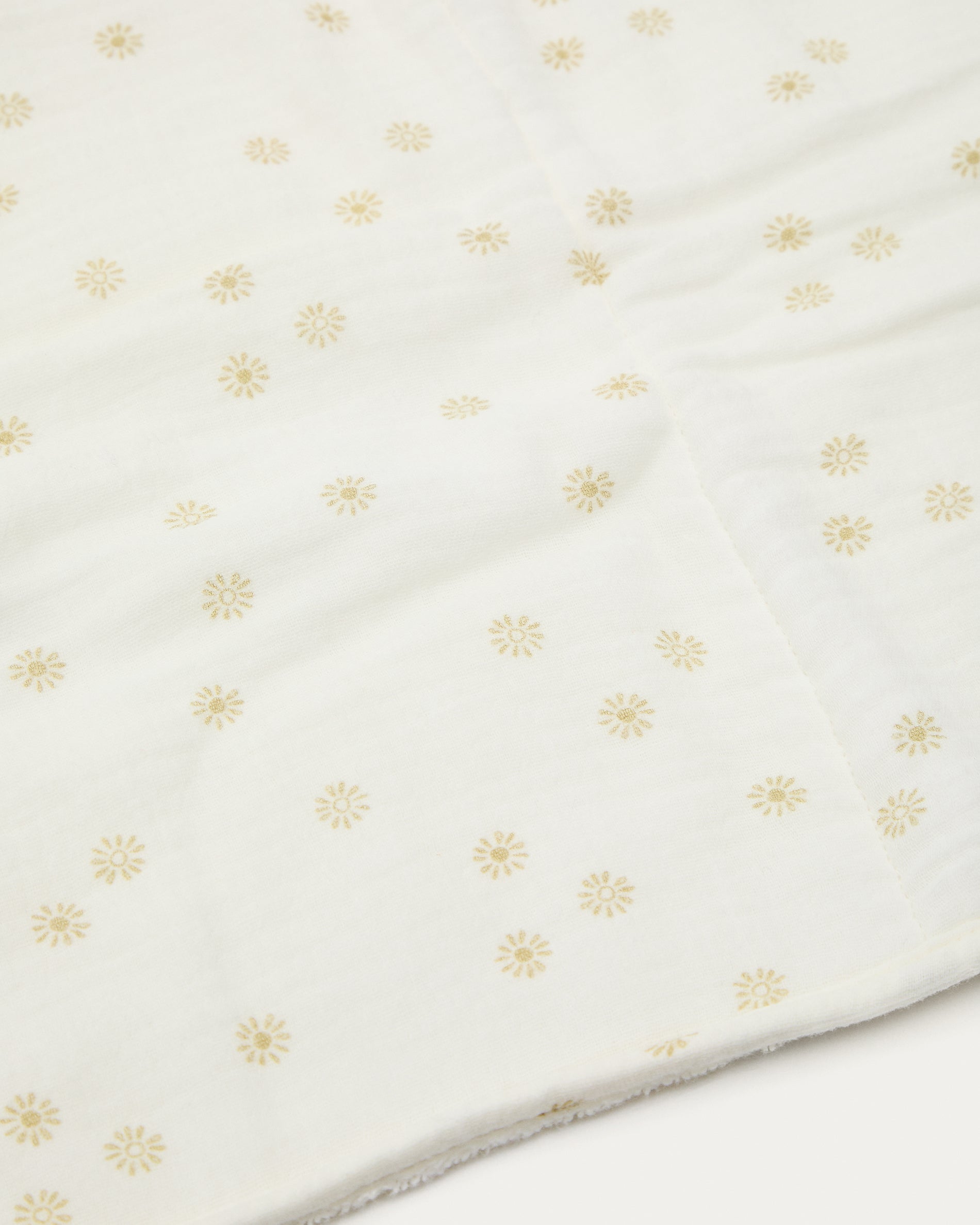 Olna travel changing mat in 100% cotton with a sun print - Detail