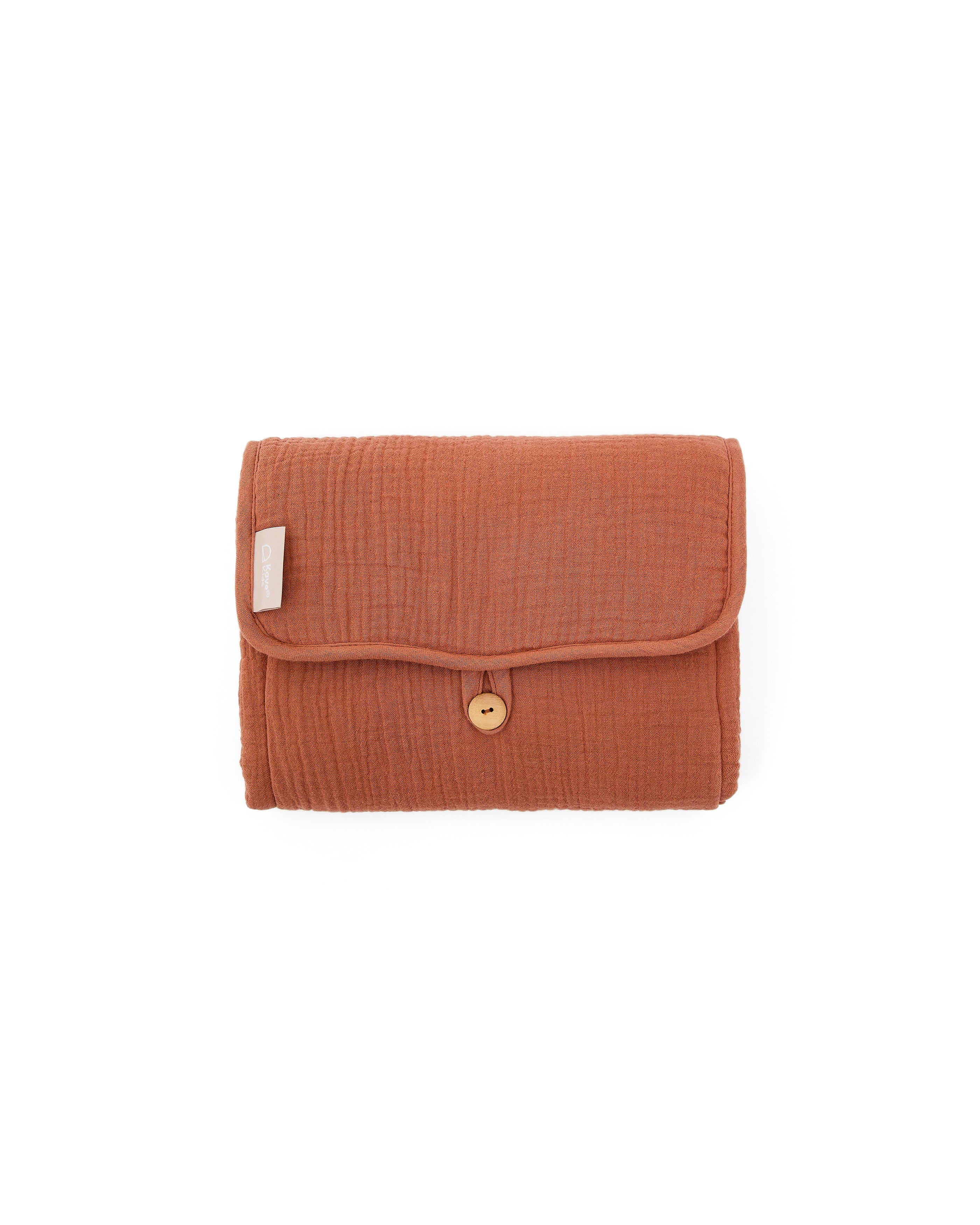 Olna travel changing mat in 100% terracotta cotton - Product Image